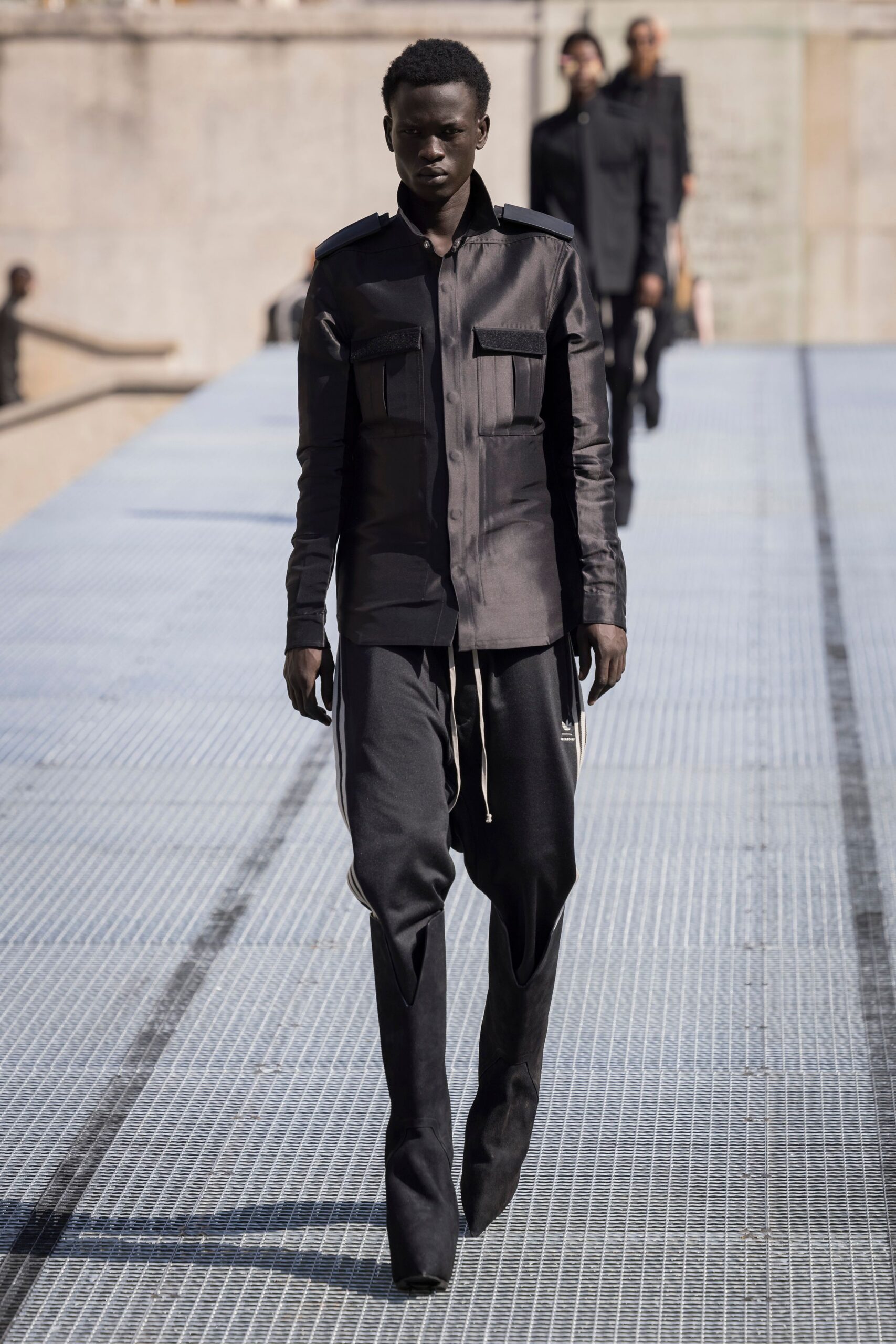 black fitted shirt and pants