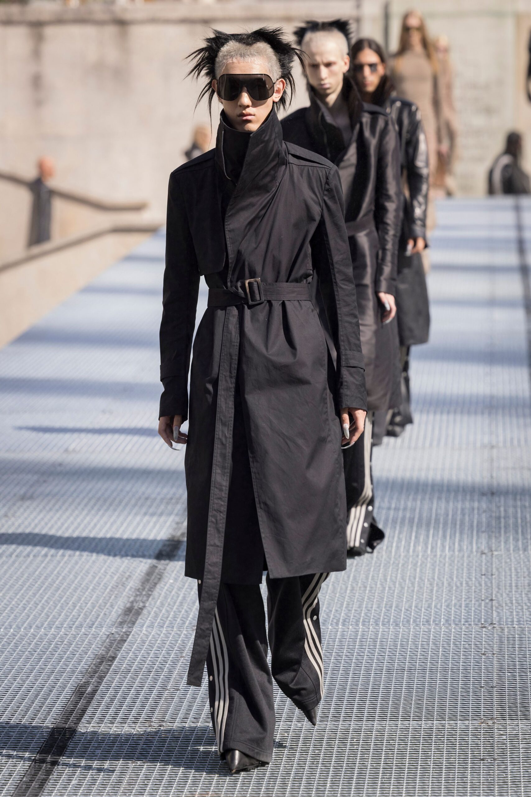 black trench coat with sunglasses