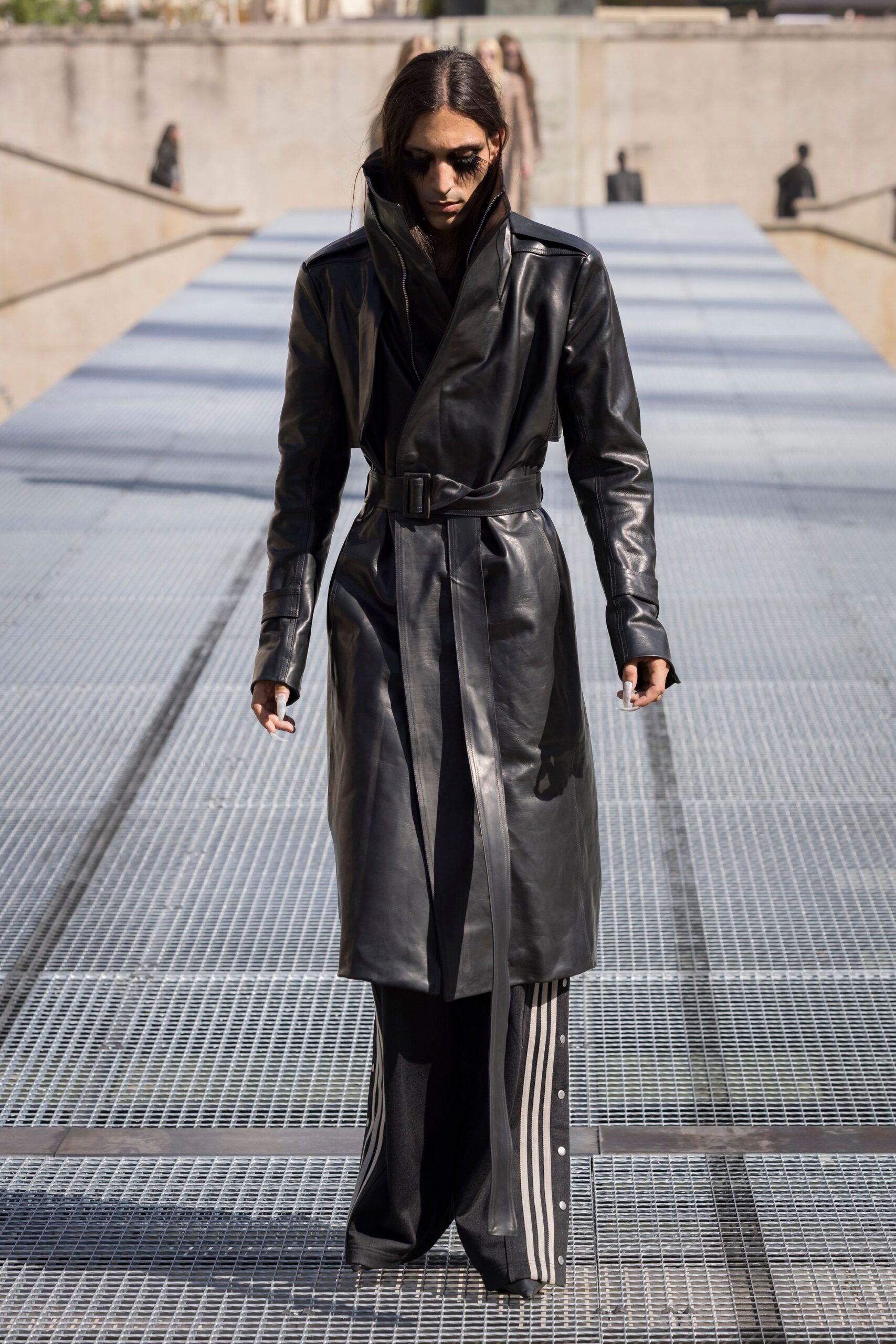 black leather coat with striped pants
