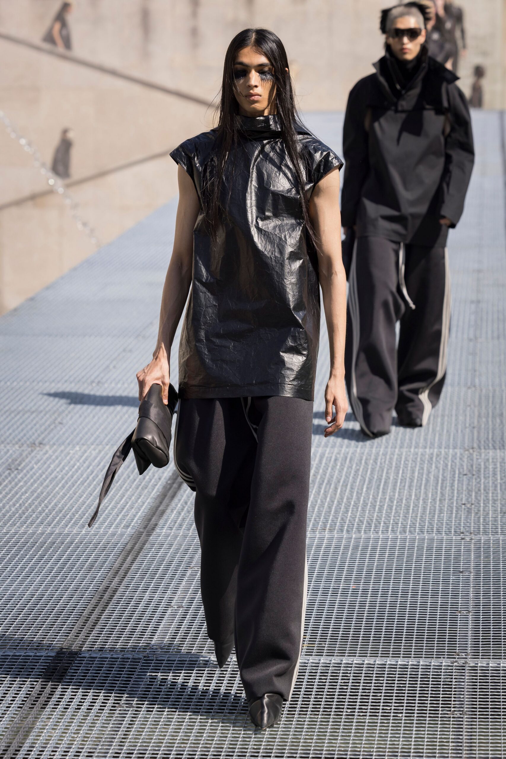 black vinyl sleeveless top with relaxed pants