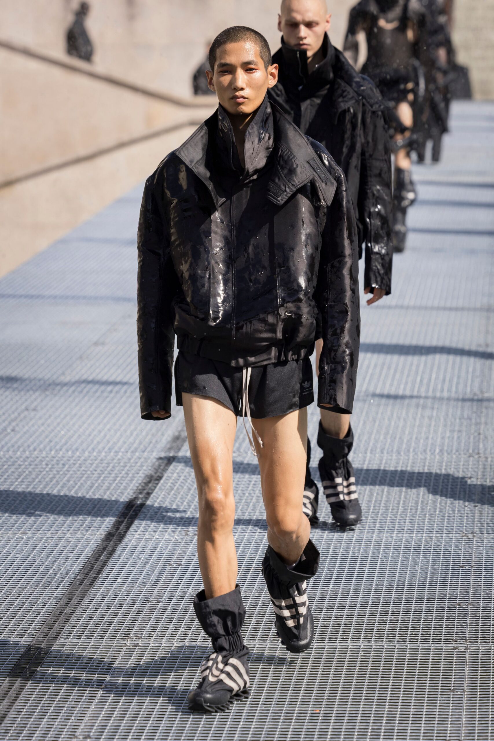 black vinyl long-sleeve collared structured zippered shiny jacket