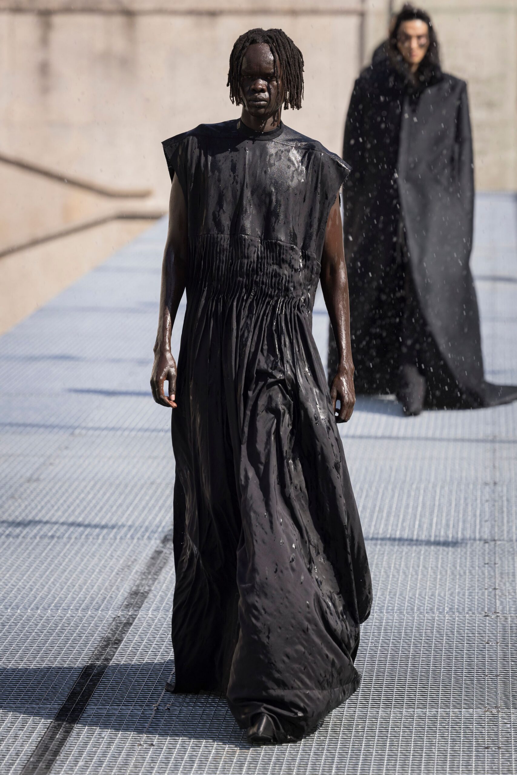 black silk sleeveless high-neck fitted pleated shiny gown