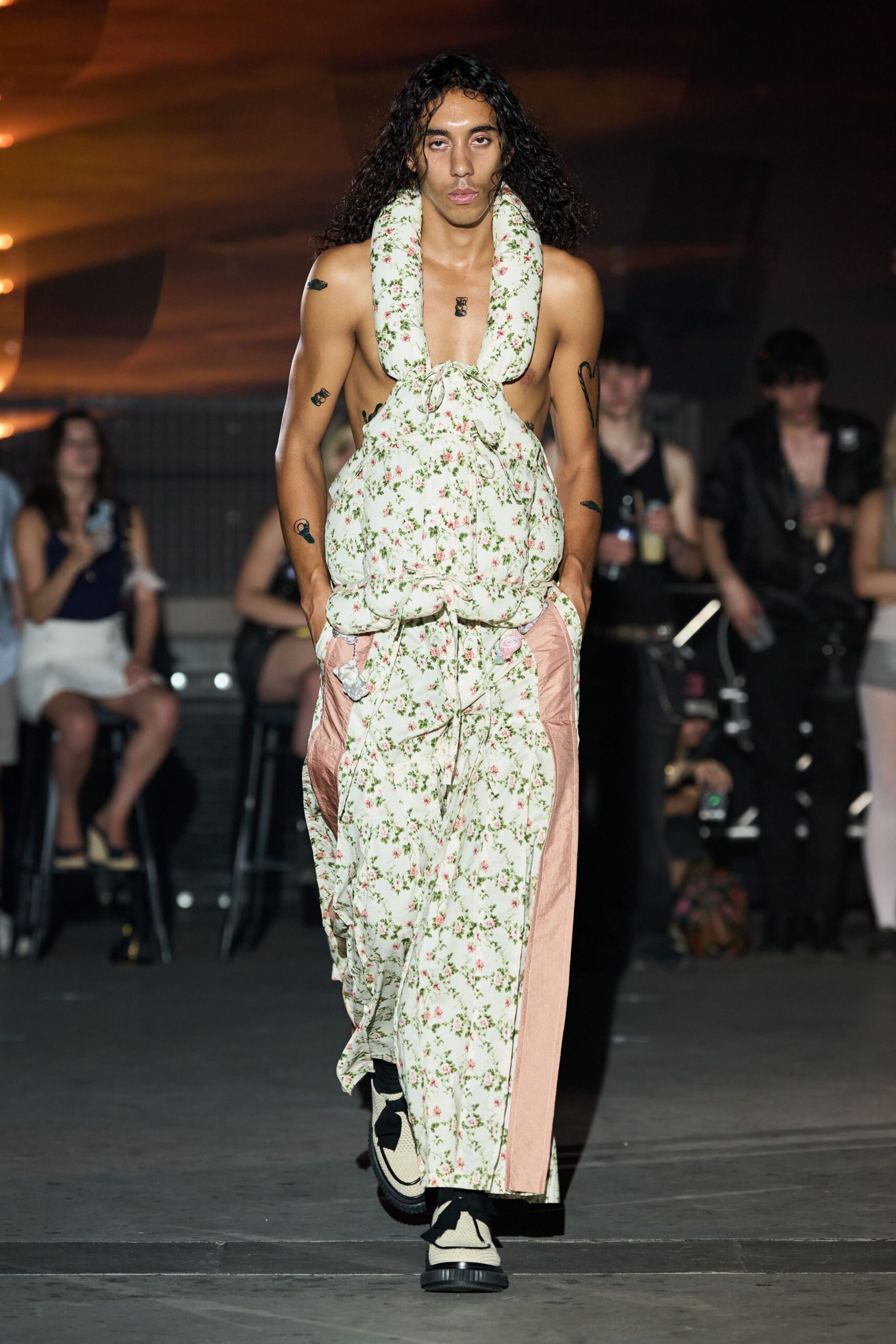white cotton sleeveless v-neck relaxed floral pleated jumpsuit