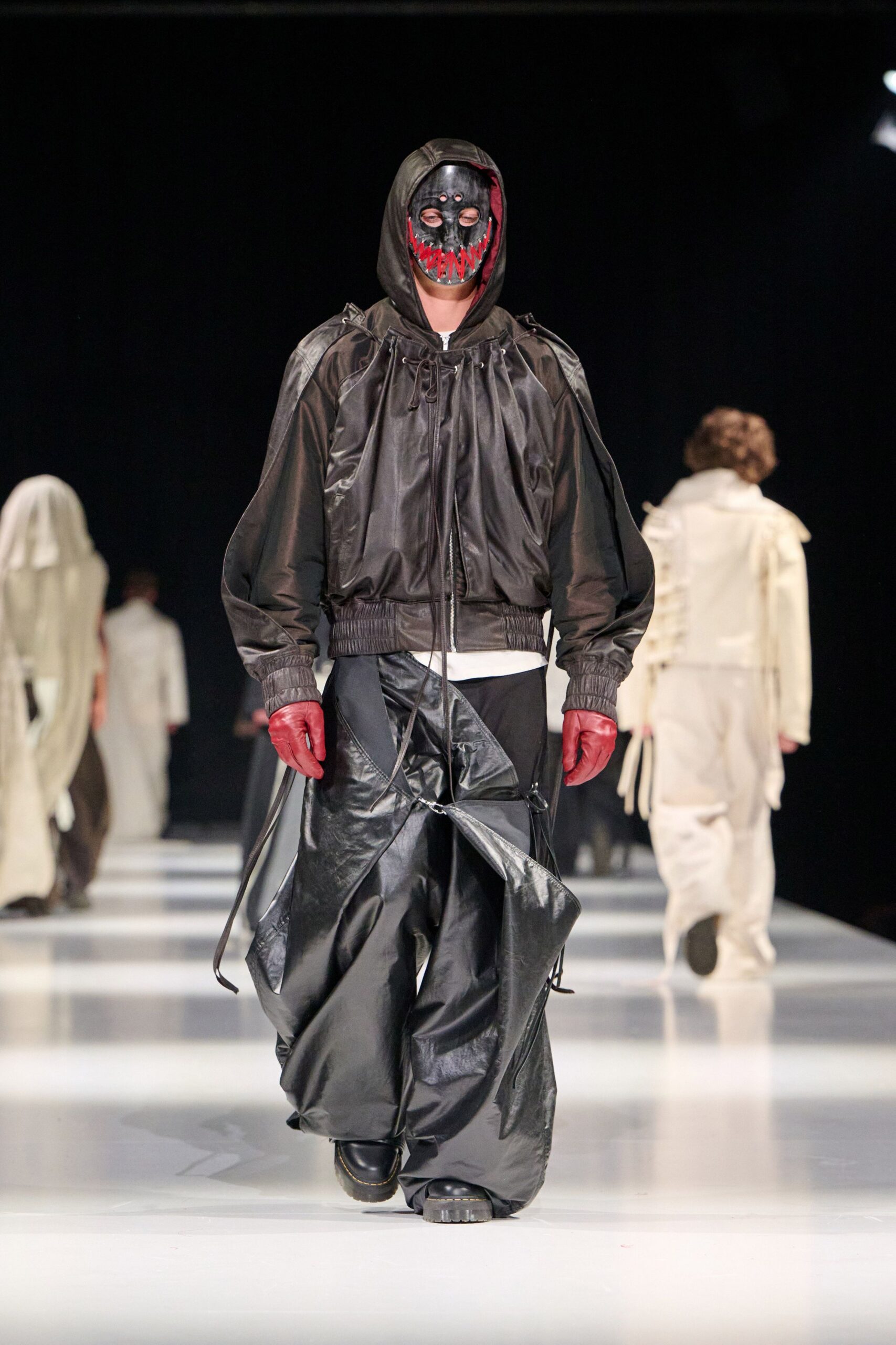 black vinyl jacket and pants