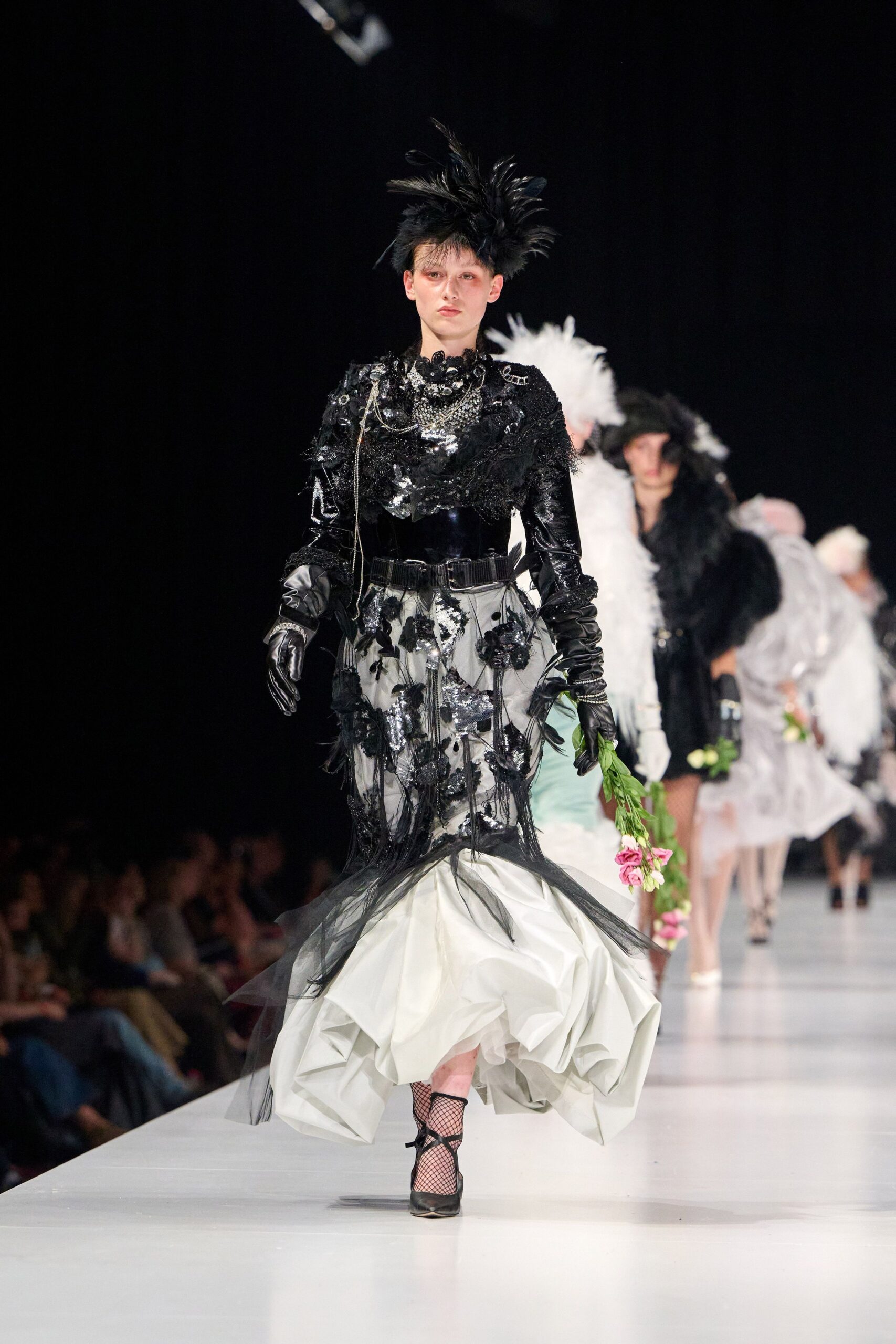 black silk long-sleeve v-neck fitted ruffled layered gown