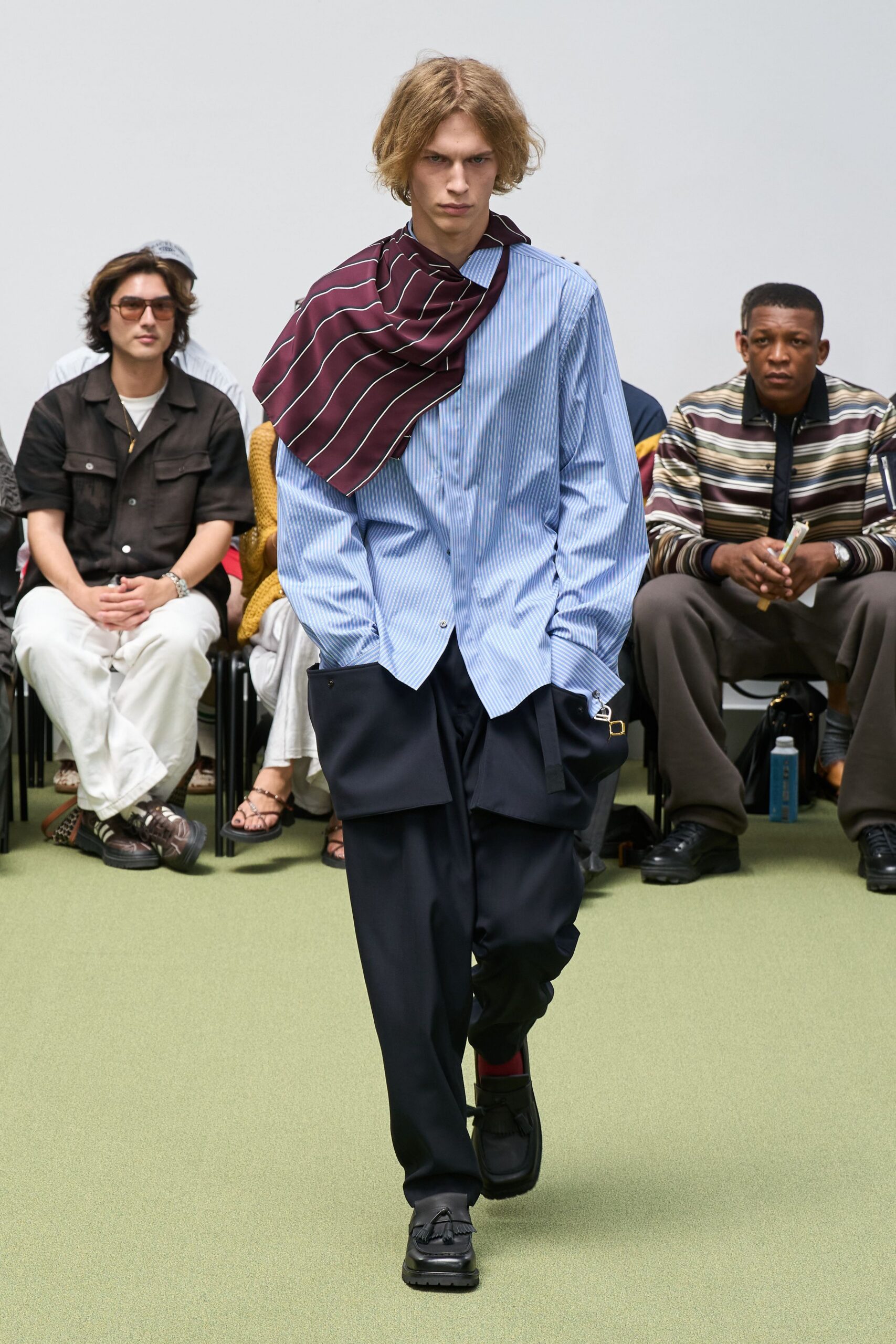 blue striped shirt with black pants