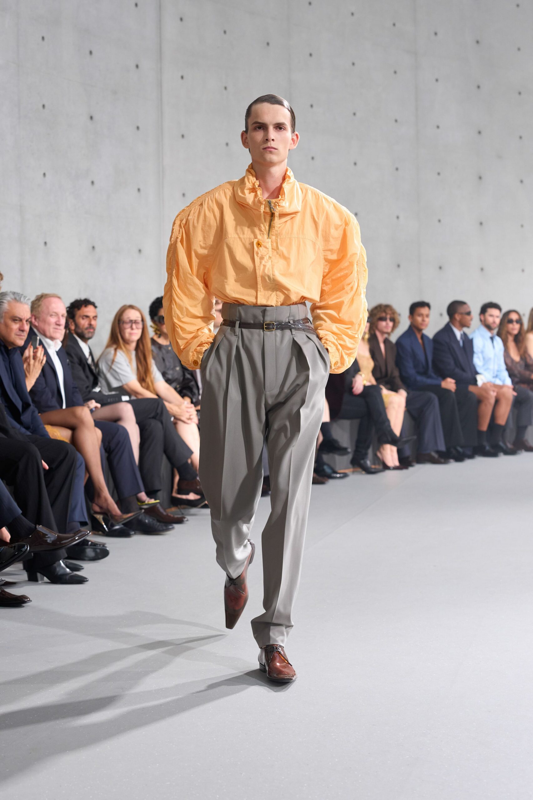 orange relaxed shirt gray tailored pants