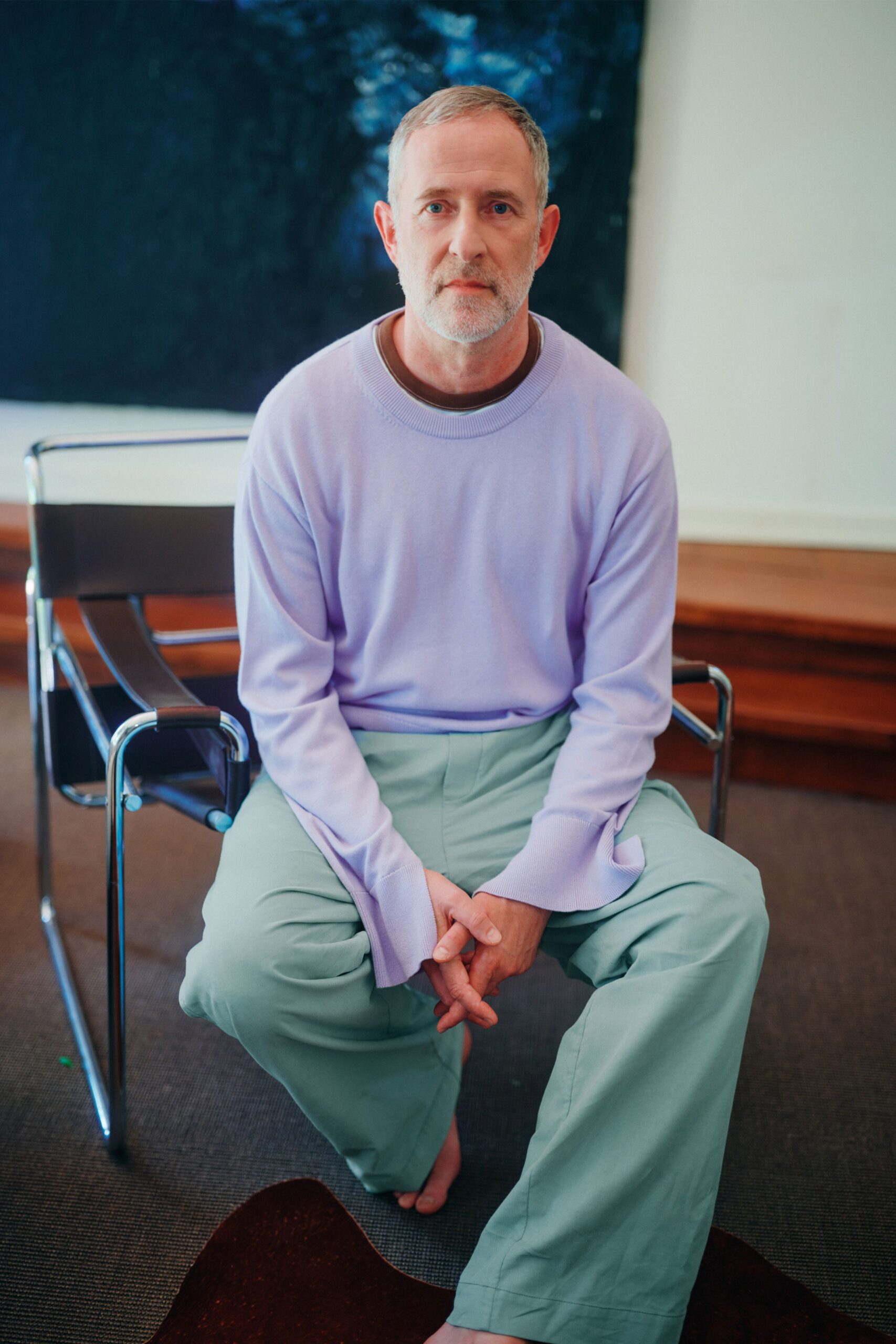 lavender relaxed sweater and green pants