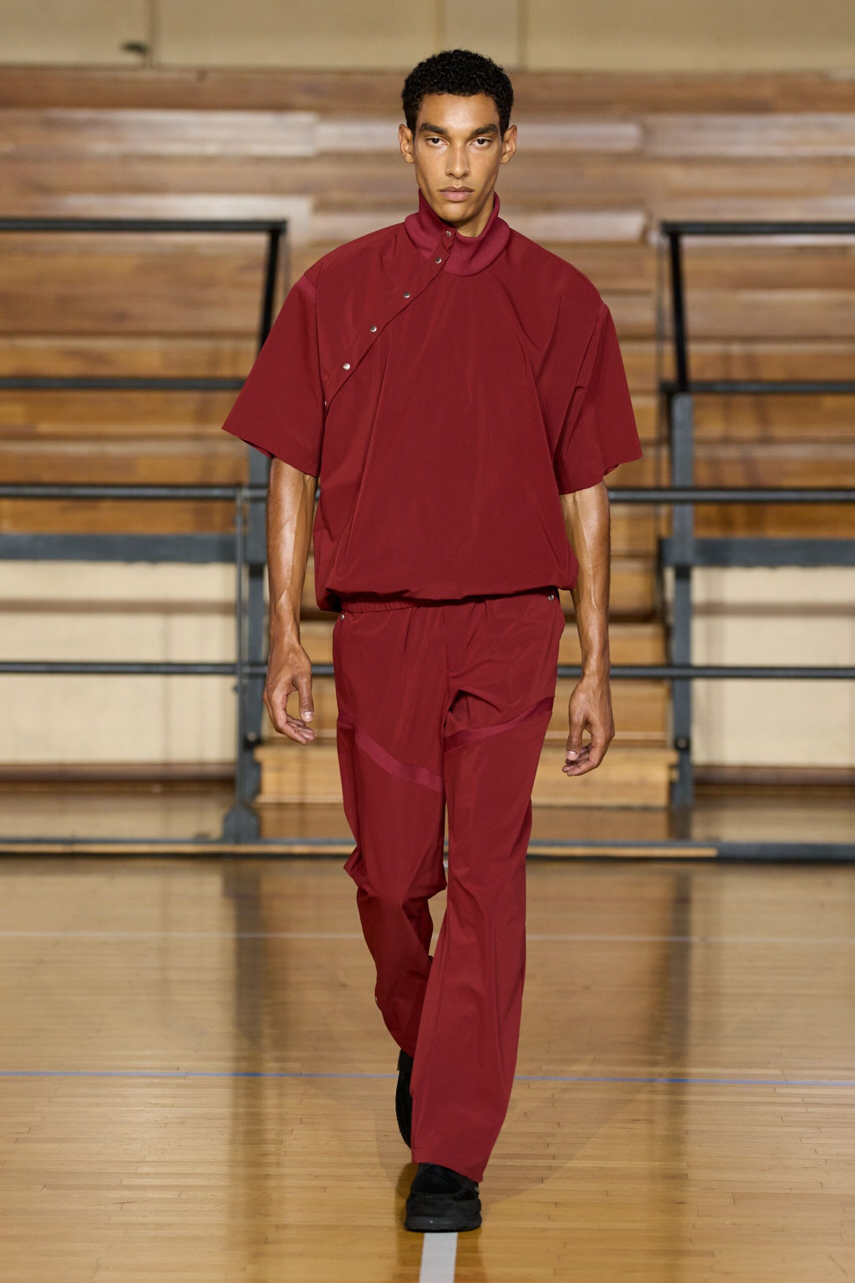 red short-sleeve collared relaxed zippered top