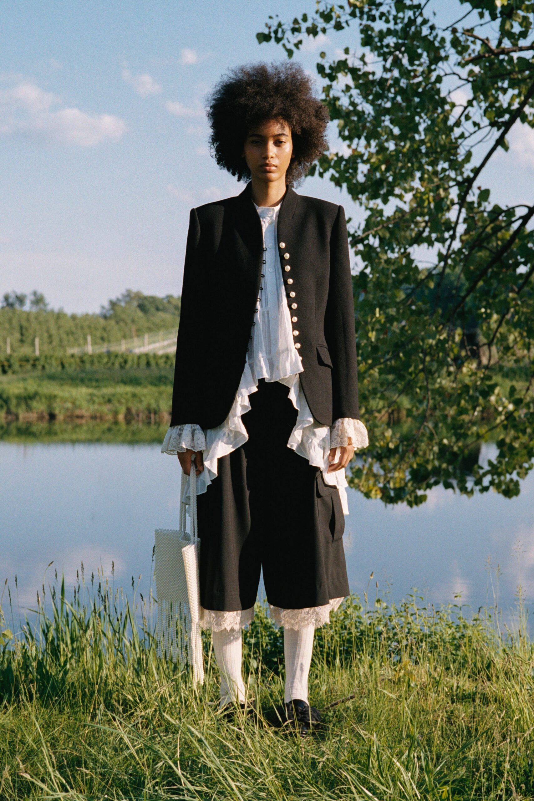 black cotton long-sleeve collared structured buttoned jacket