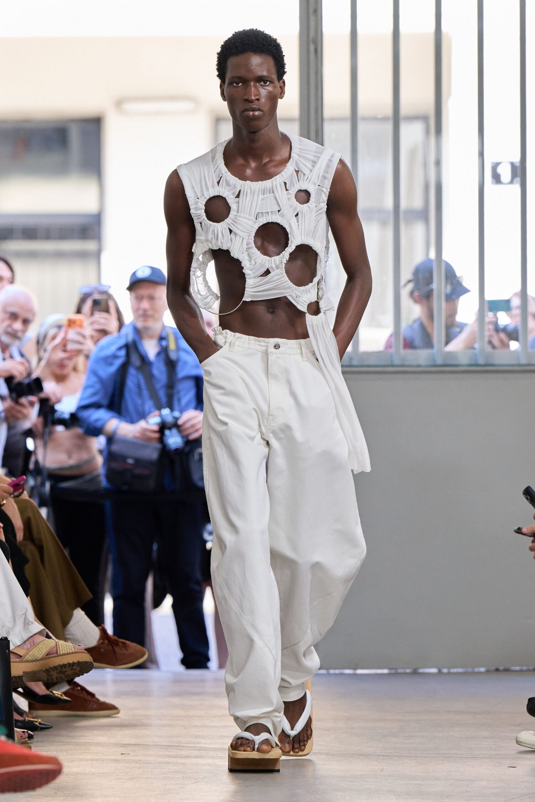 white cotton sleeveless high-neck fitted top