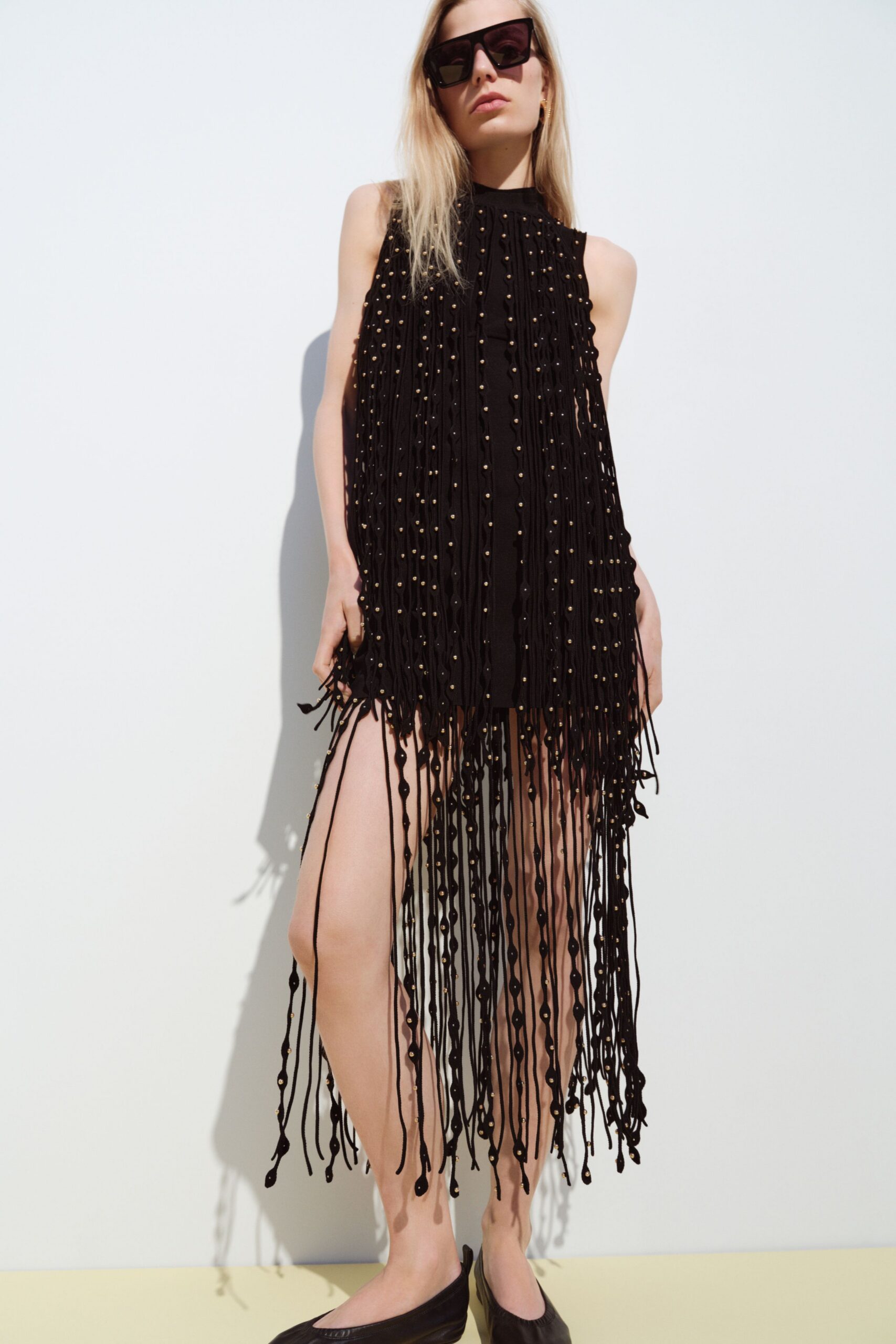 black cotton sleeveless high-neck fitted fringed mini dress