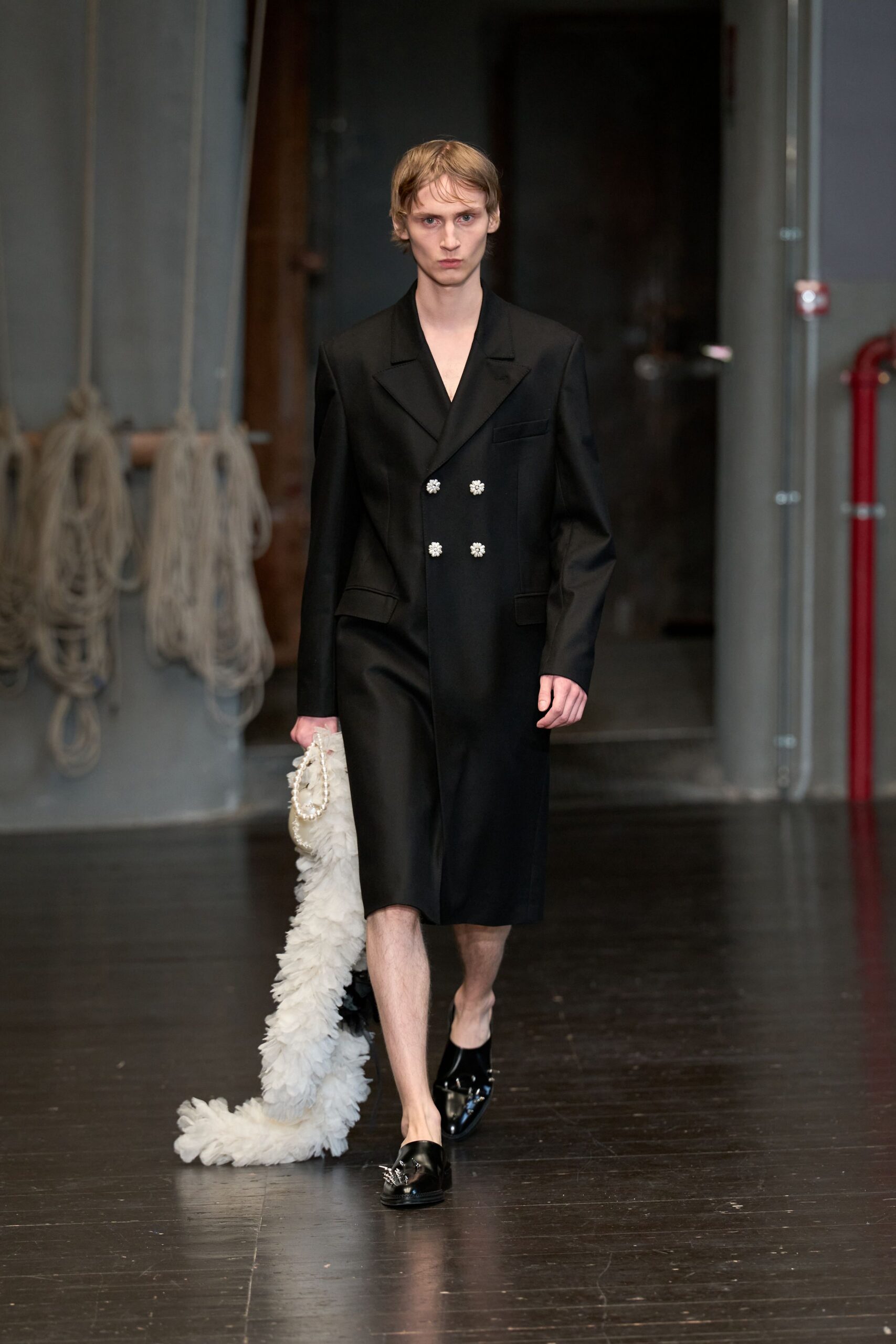 black wool long-sleeve collared structured buttoned midi coat