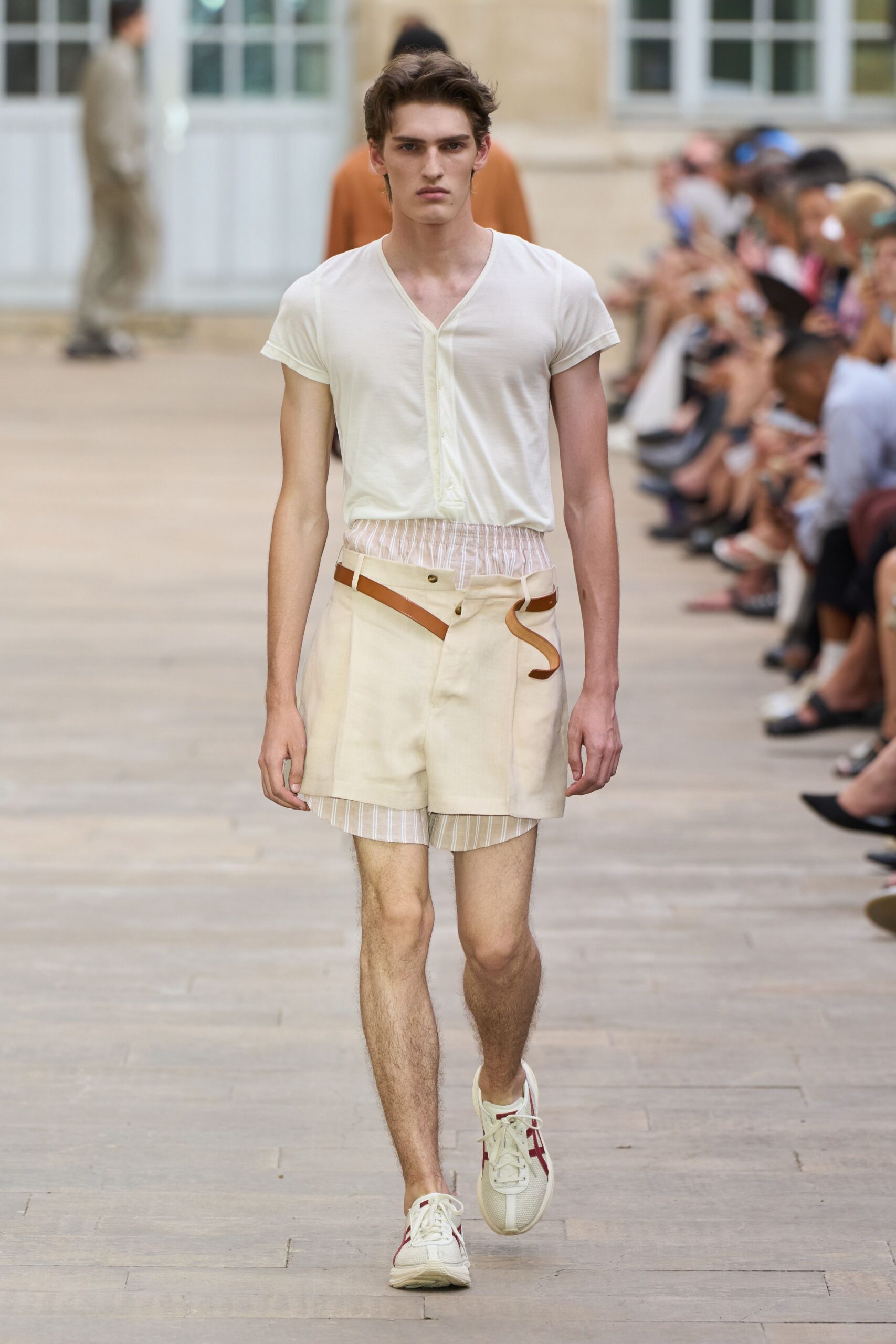 white fitted shirt beige shorts