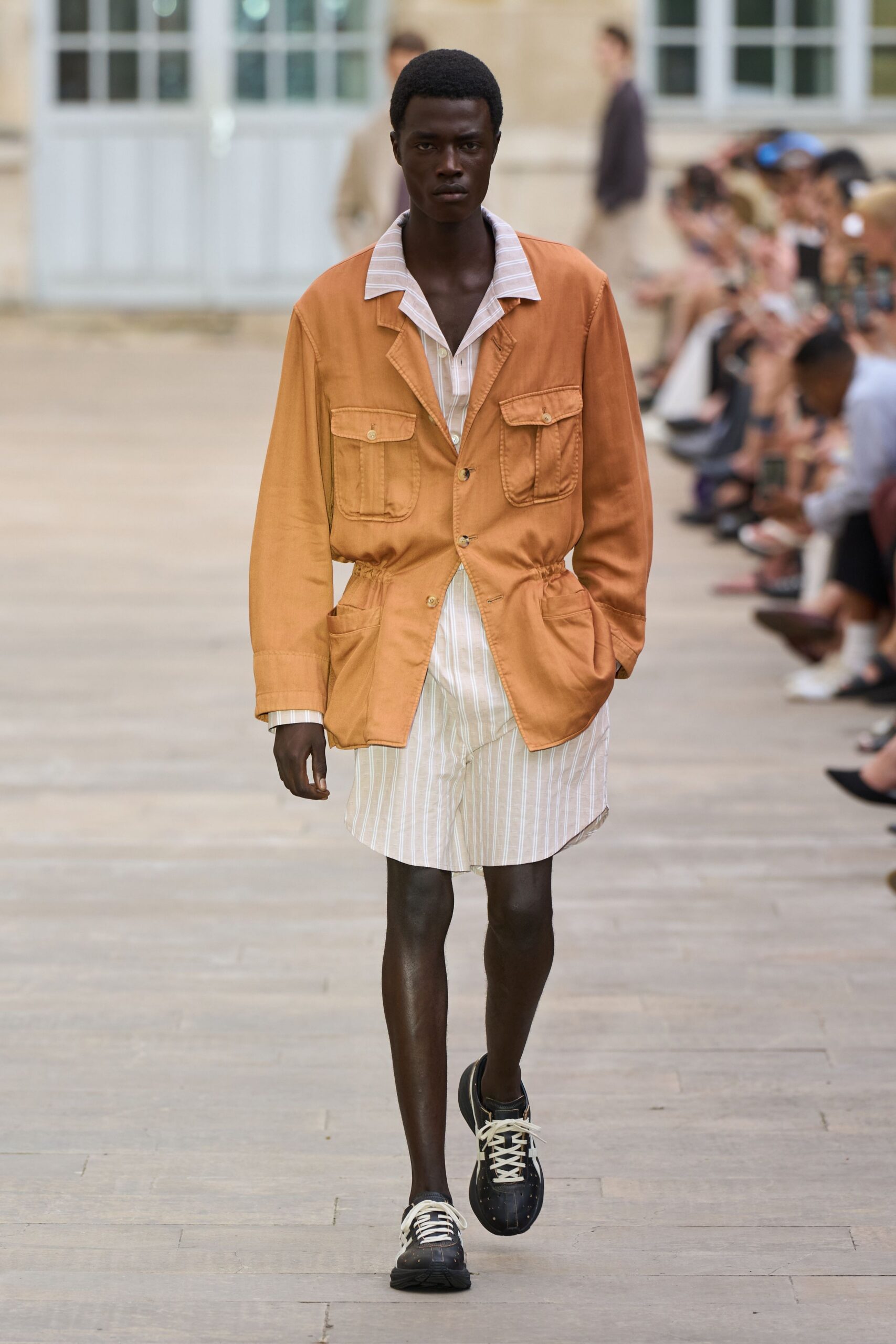orange relaxed jacket with striped shirt