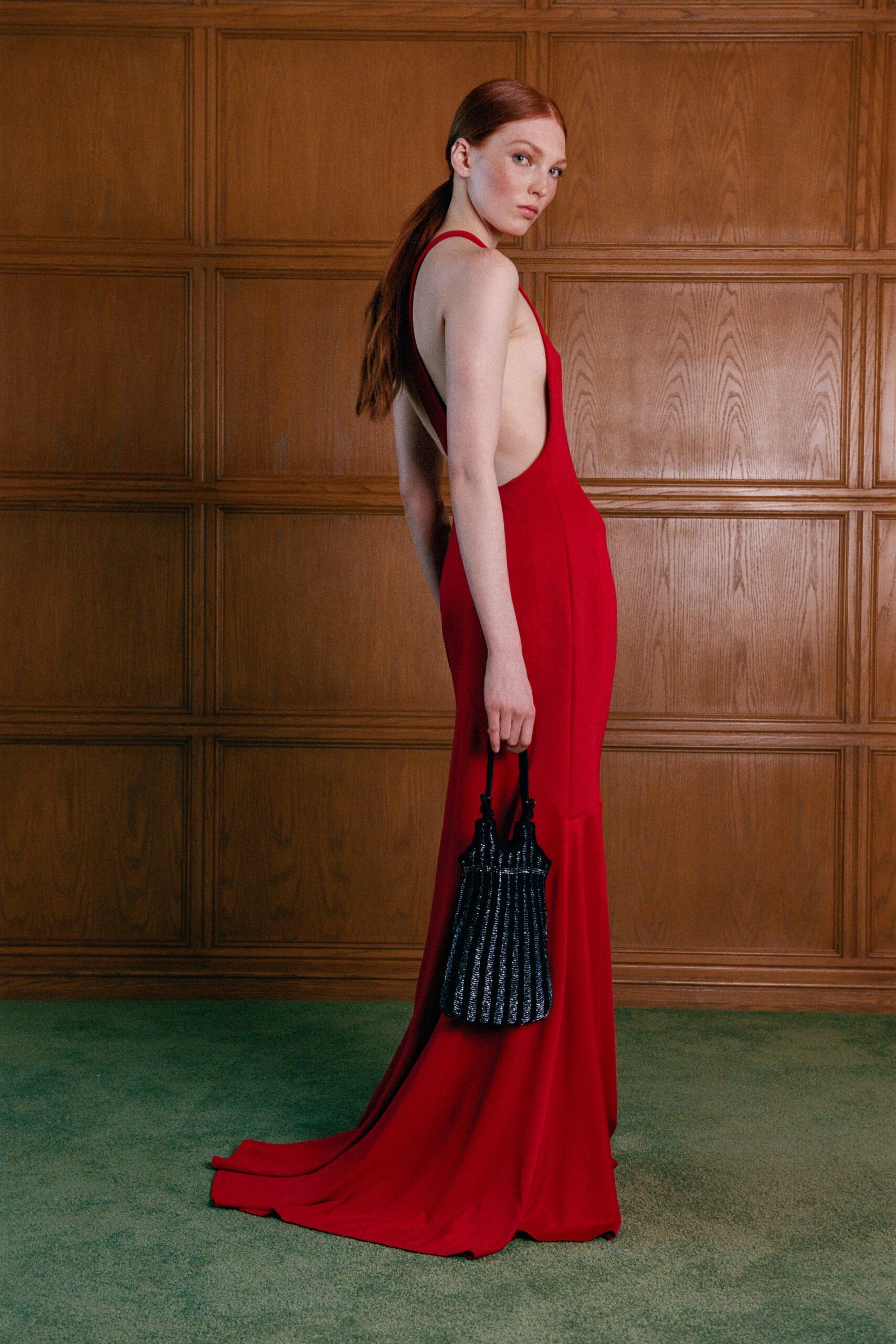 red silk sleeveless backless fitted flared maxi gown