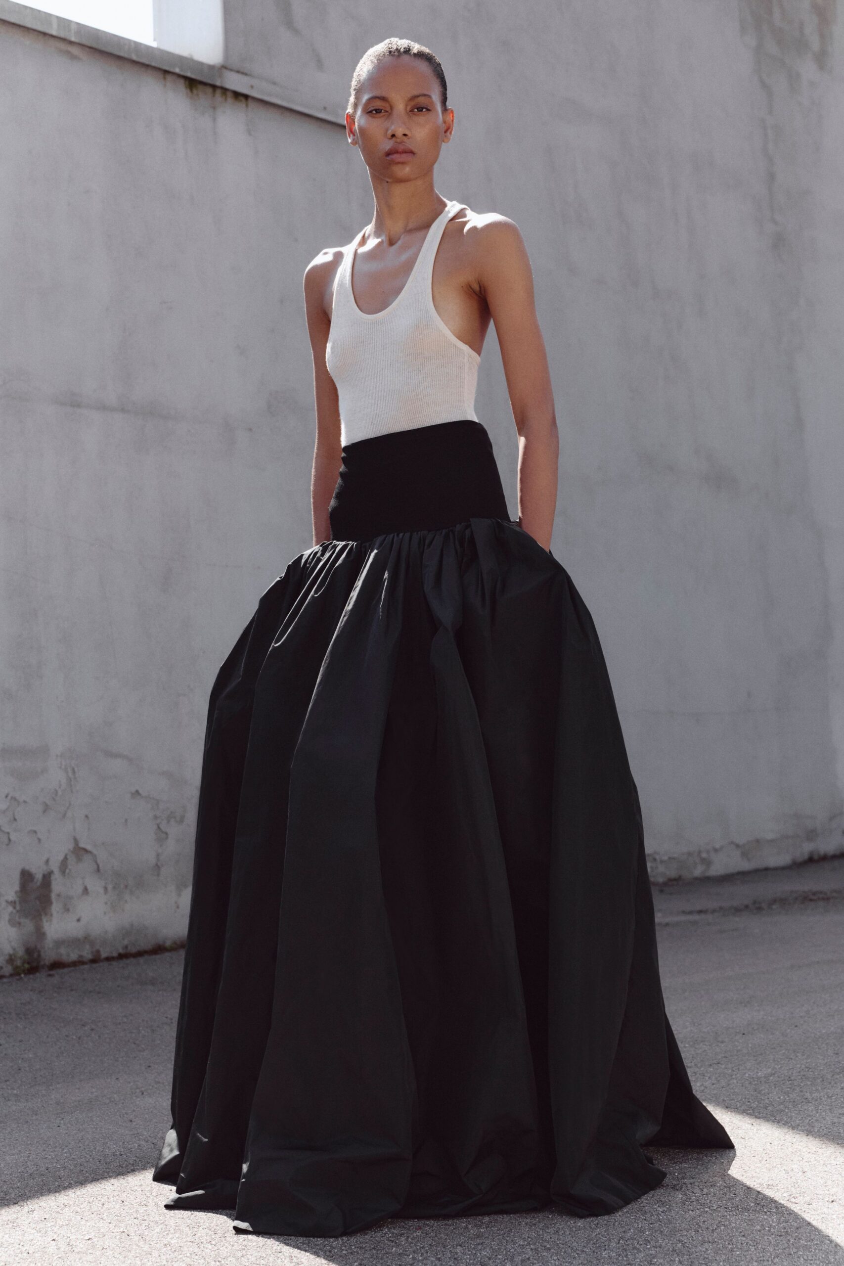 black silk relaxed high-waisted pleated maxi skirt
