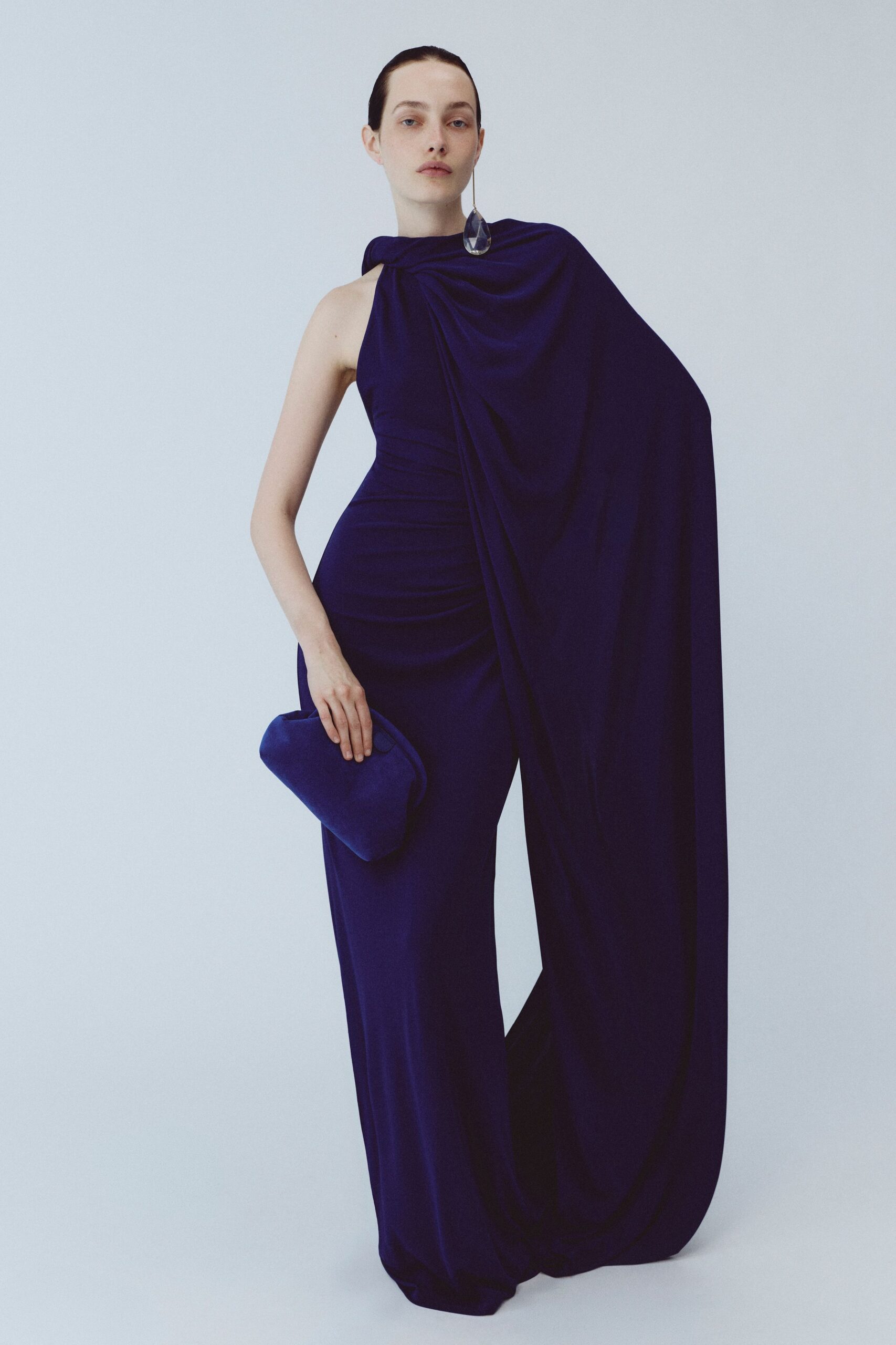 blue silk sleeveless high-neck fitted draped flowing gown