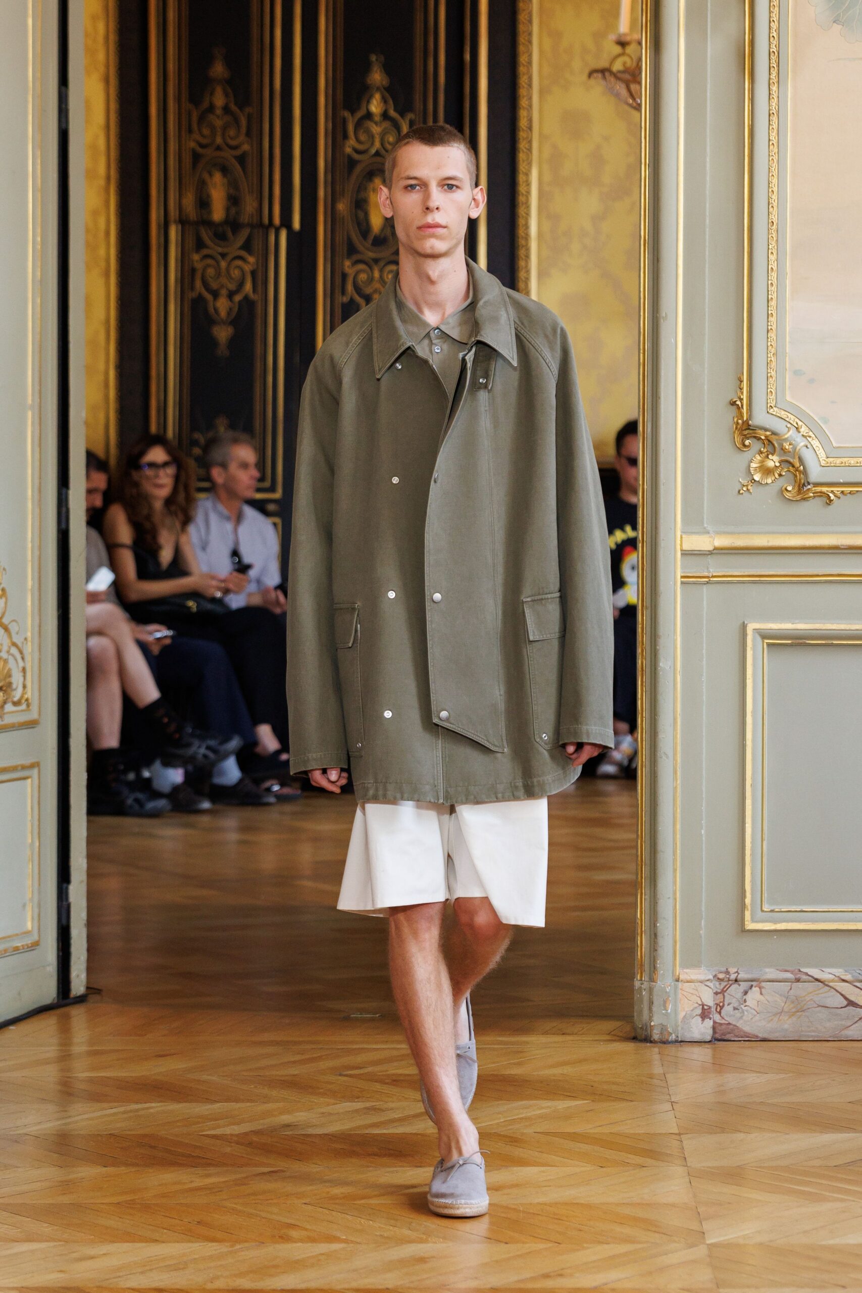 green relaxed jacket with white shorts