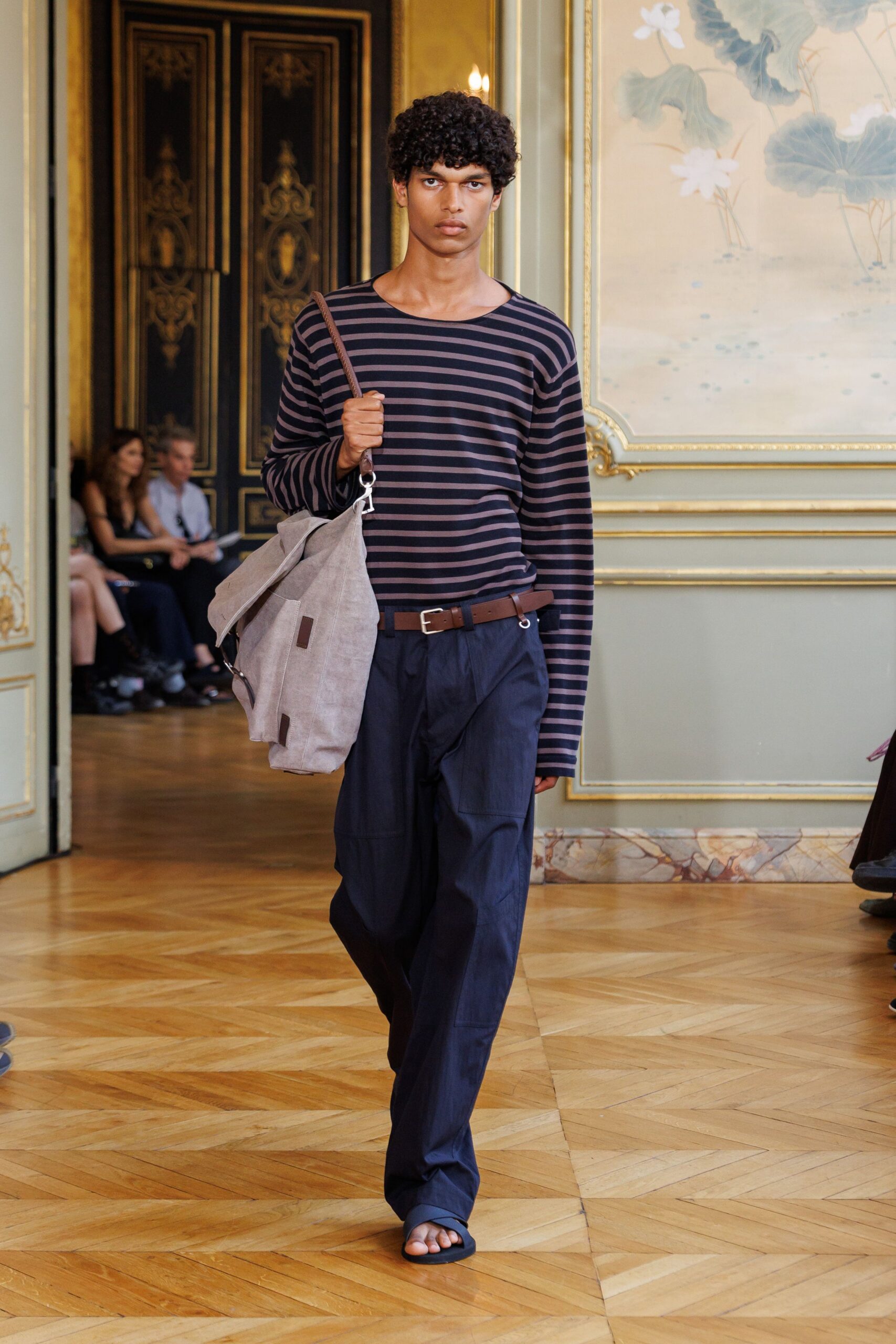 purple striped shirt and navy pants