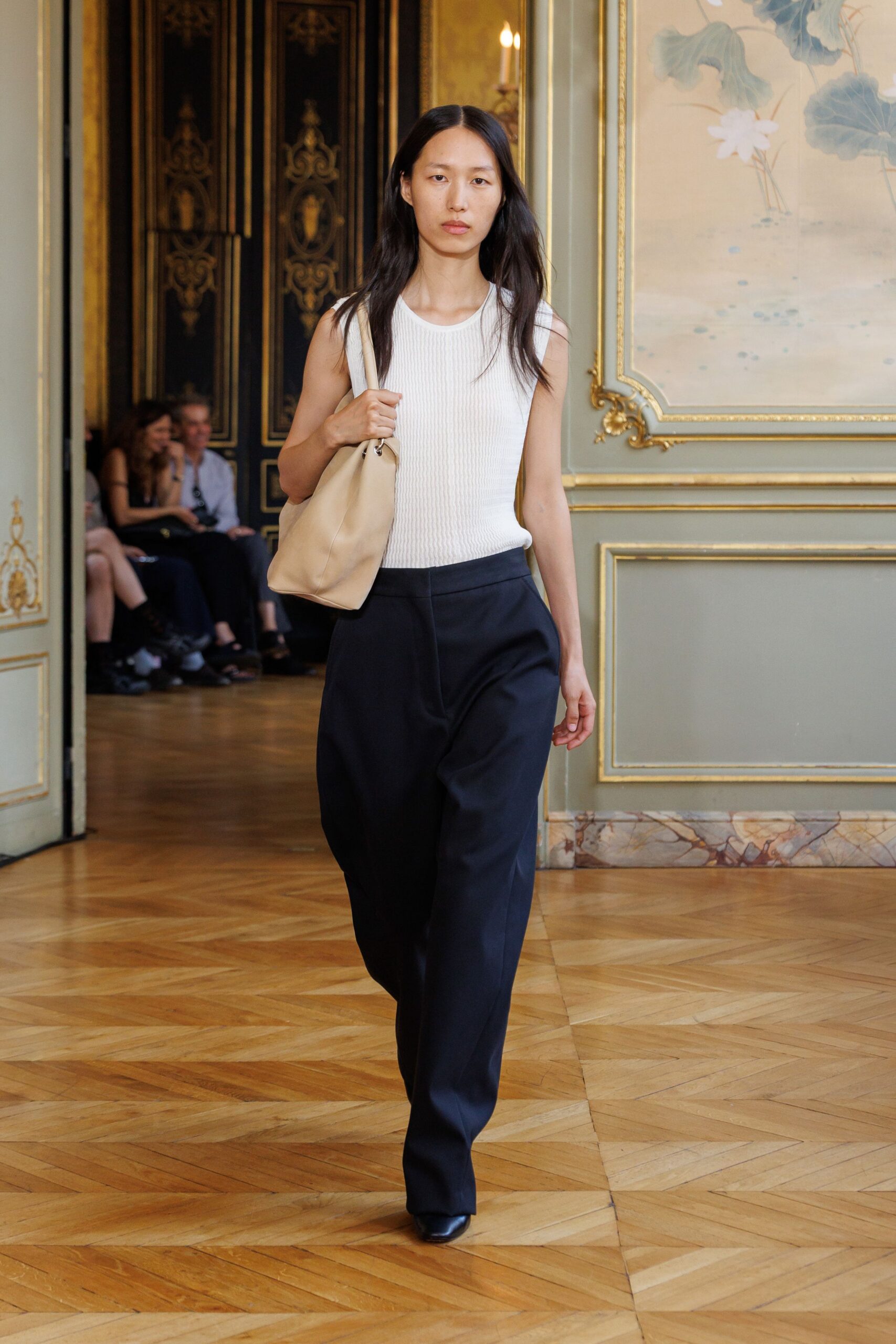 white fitted top black pants