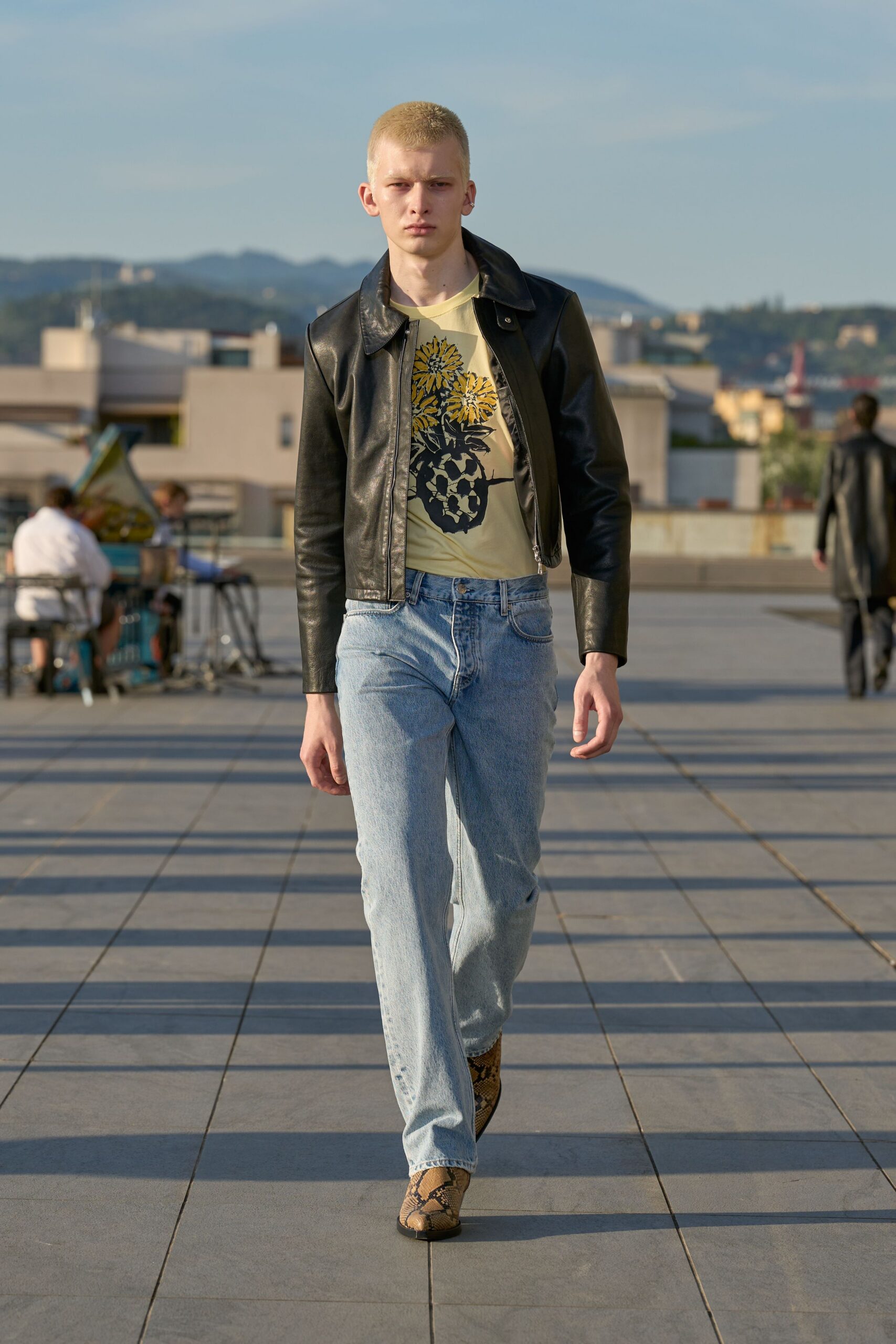 black leather long-sleeve collared fitted jacket