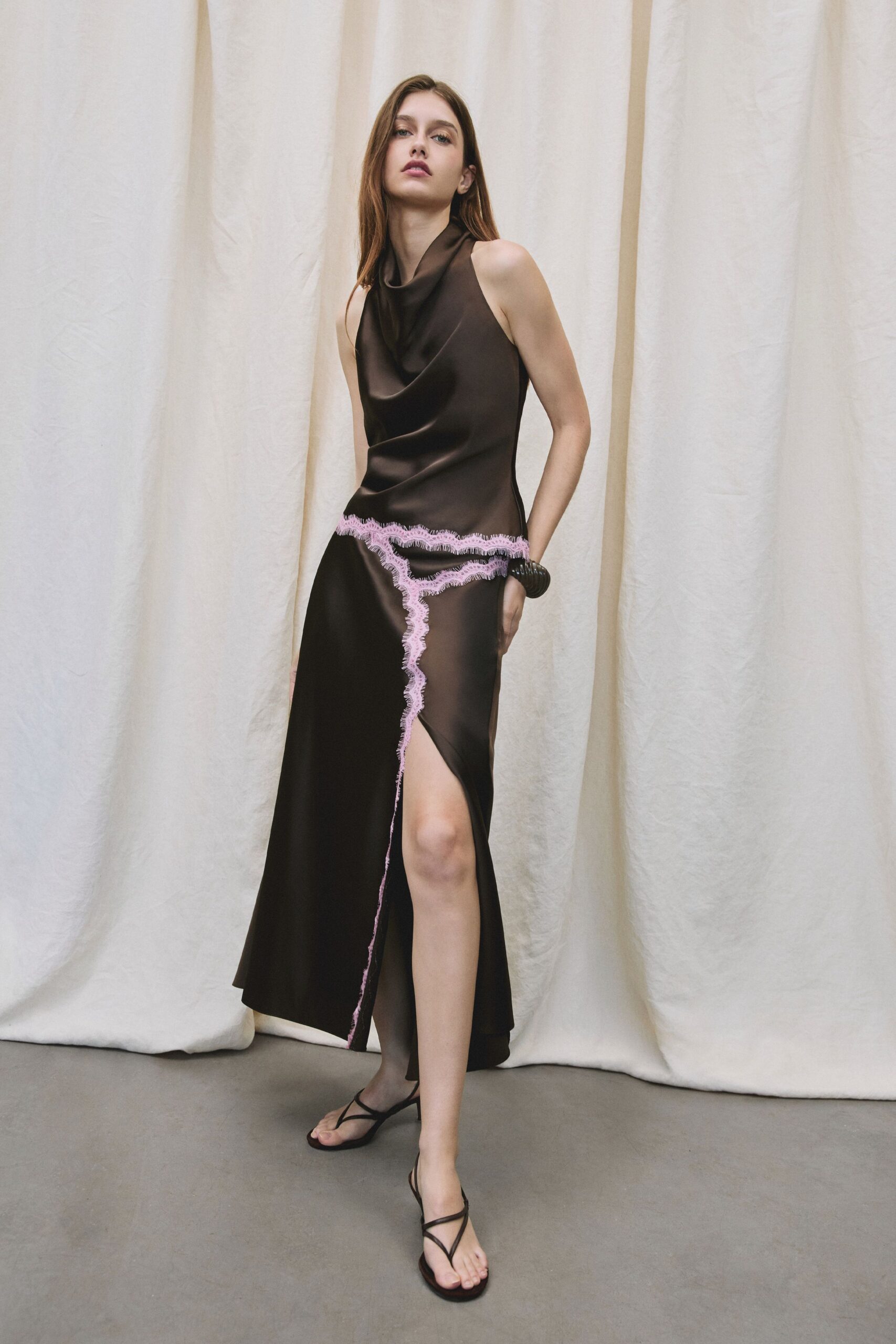 brown silk sleeveless high-neck fitted flowing midi dress