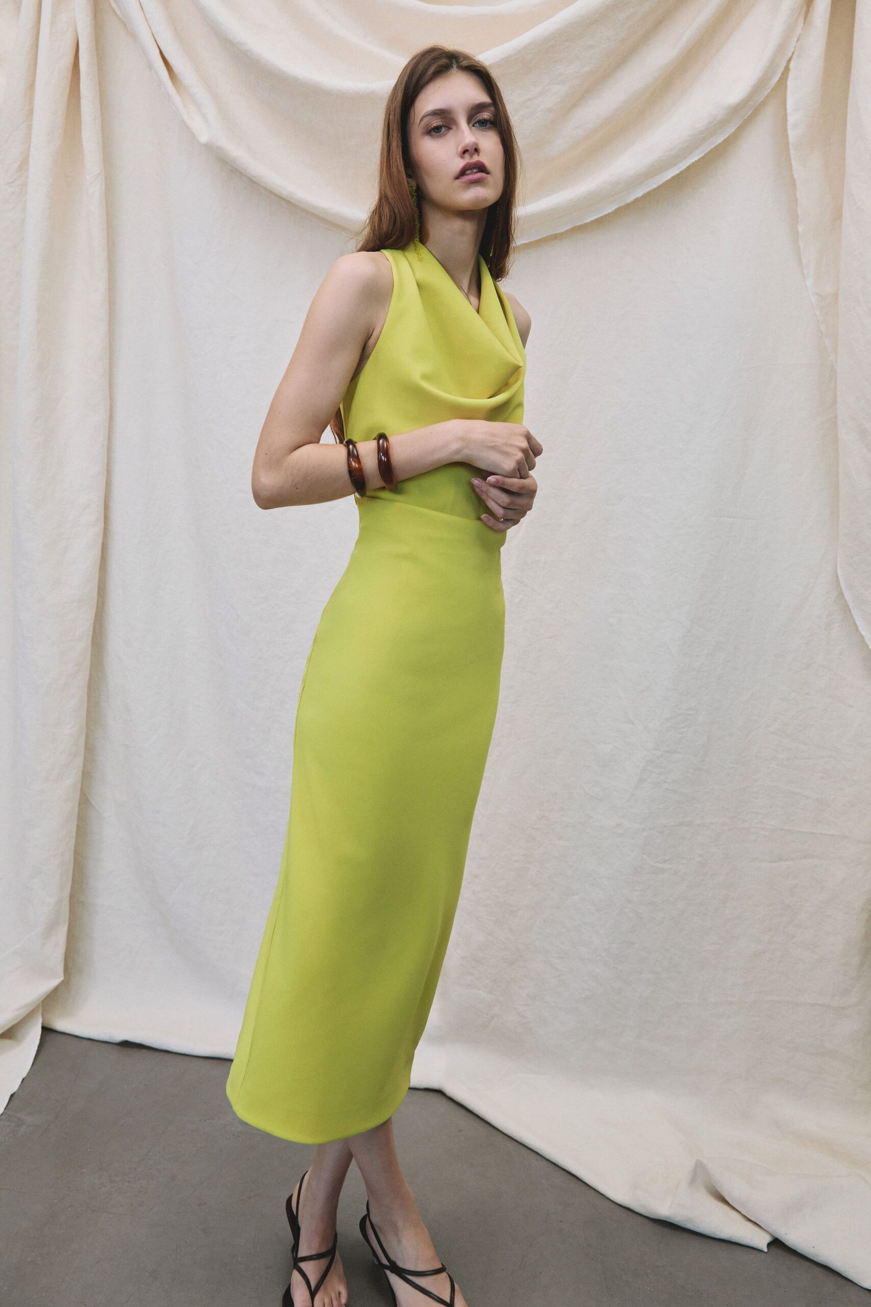 yellow neoprene sleeveless high-neck fitted draped midi dress