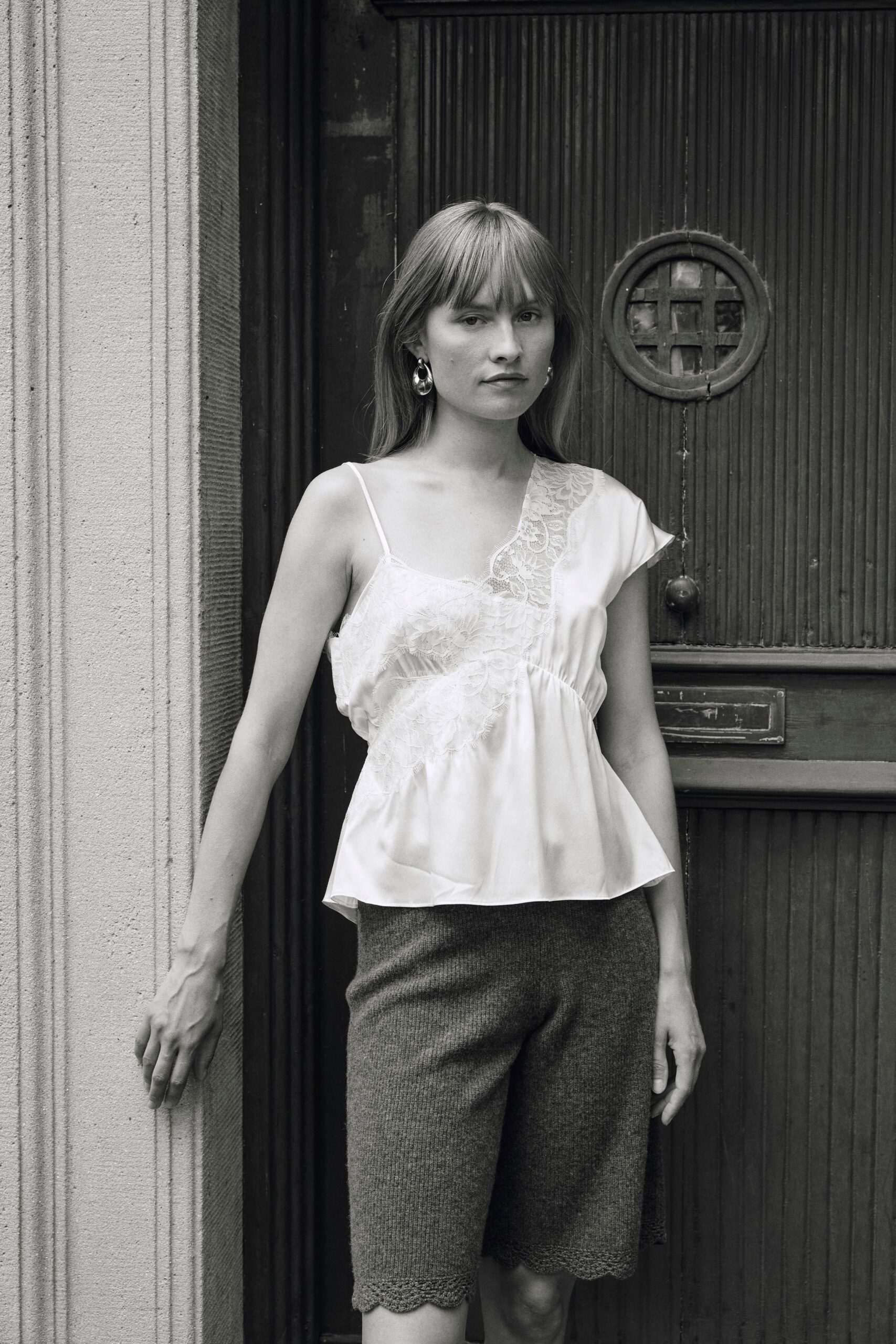 white silk sleeveless v-neck relaxed ruffled top