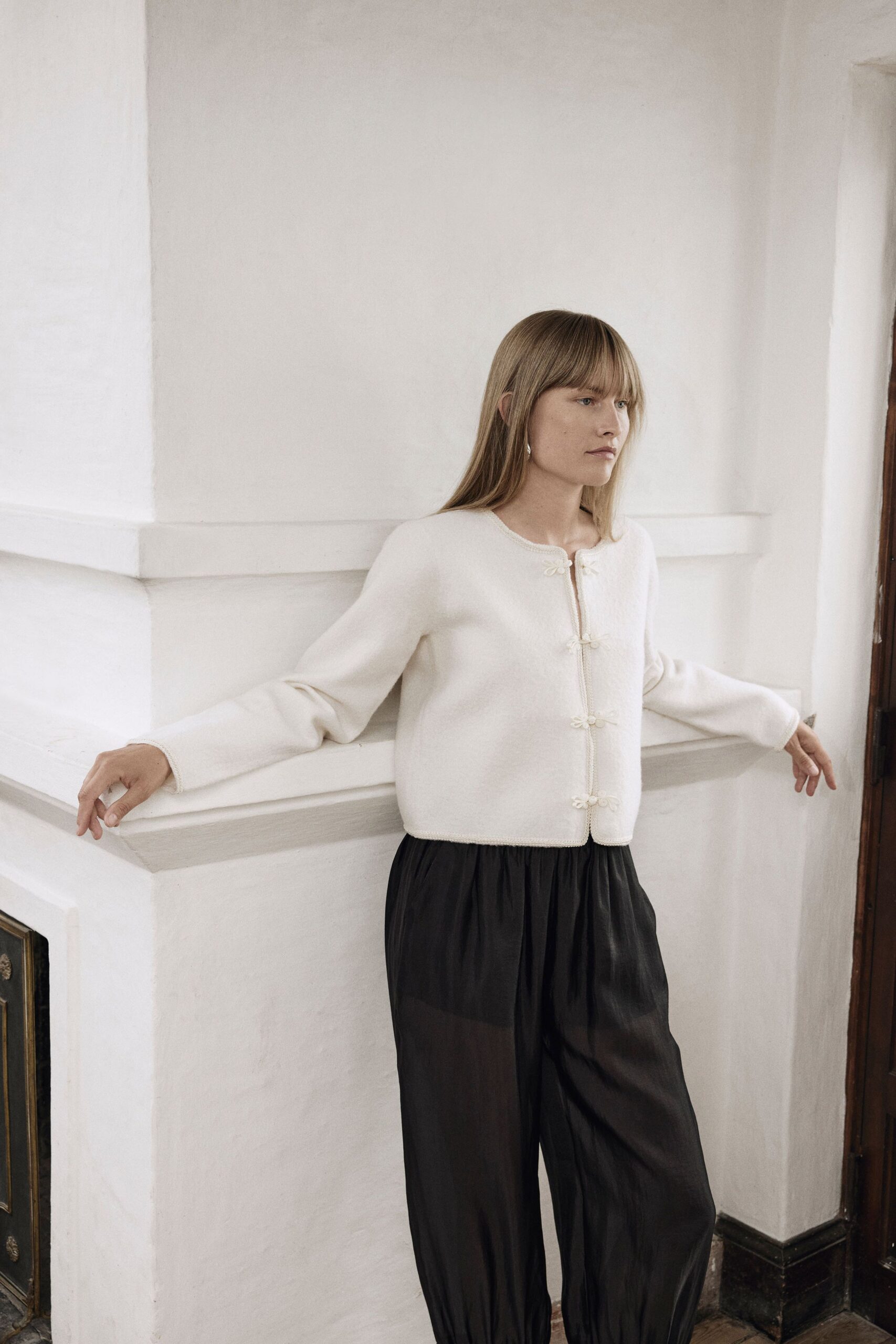 white wool long-sleeve collared fitted buttoned cardigan