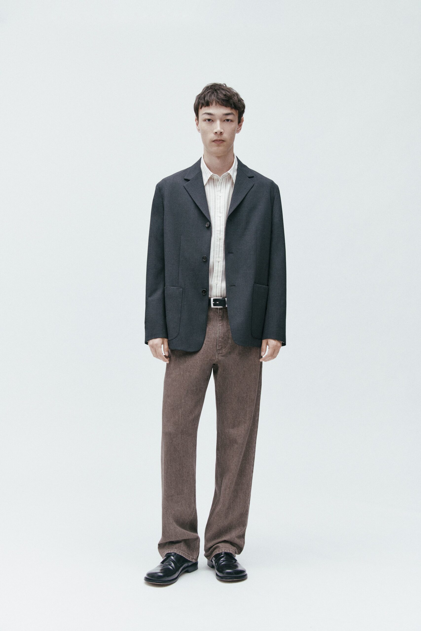 gray blazer white shirt brown pants