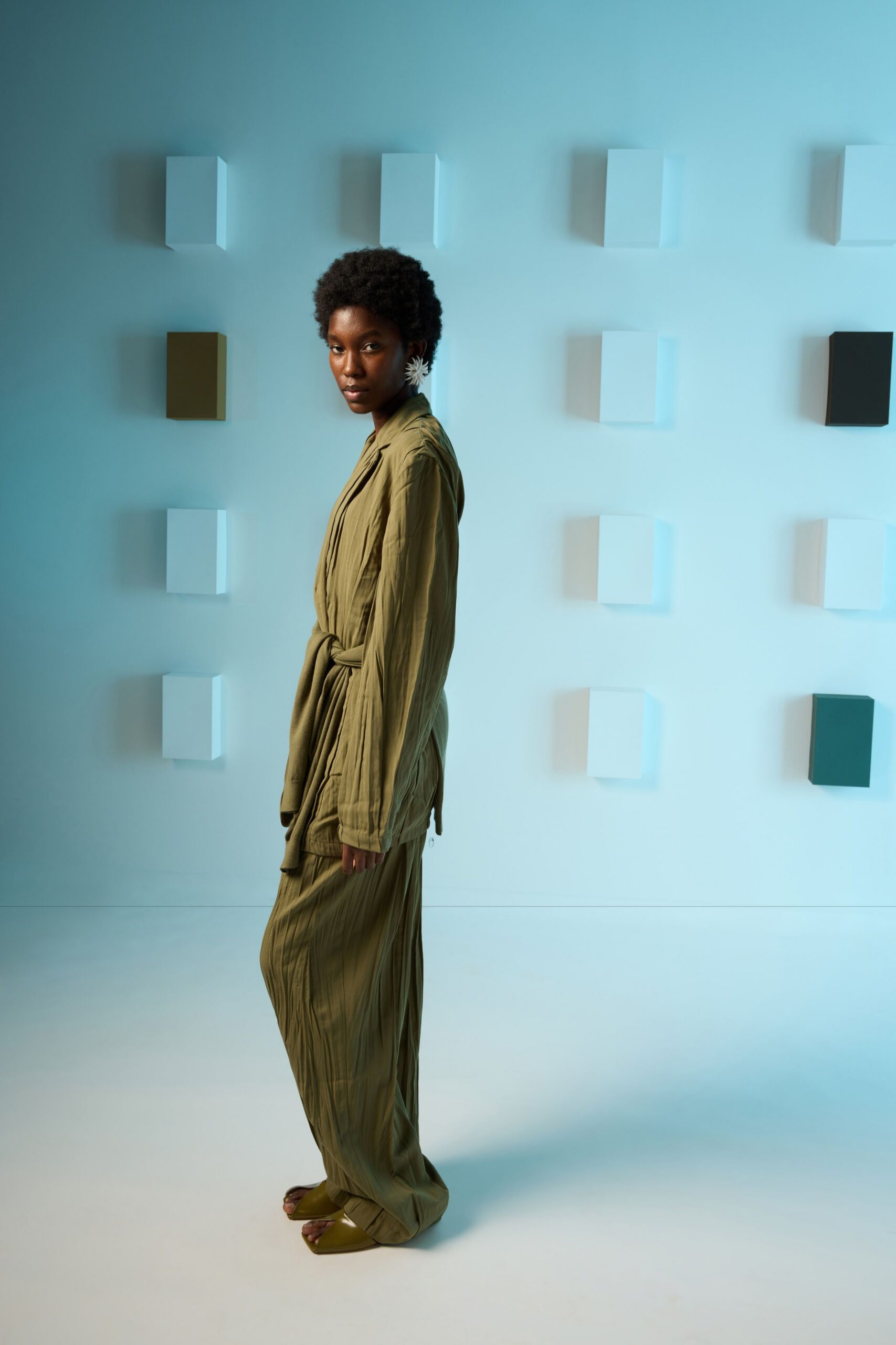 green cotton long-sleeve collared relaxed pleated jumpsuit