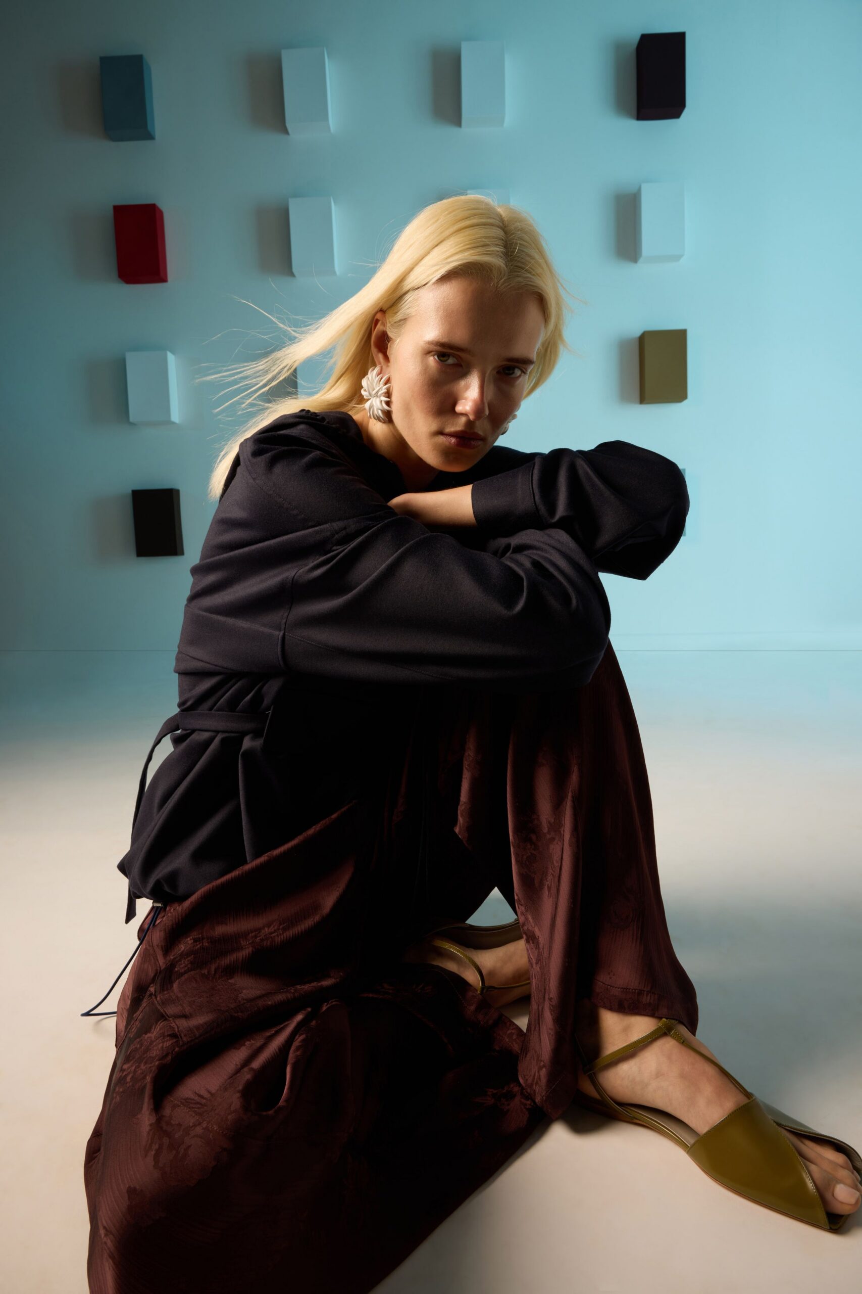 black cotton long-sleeve collared relaxed zippered top