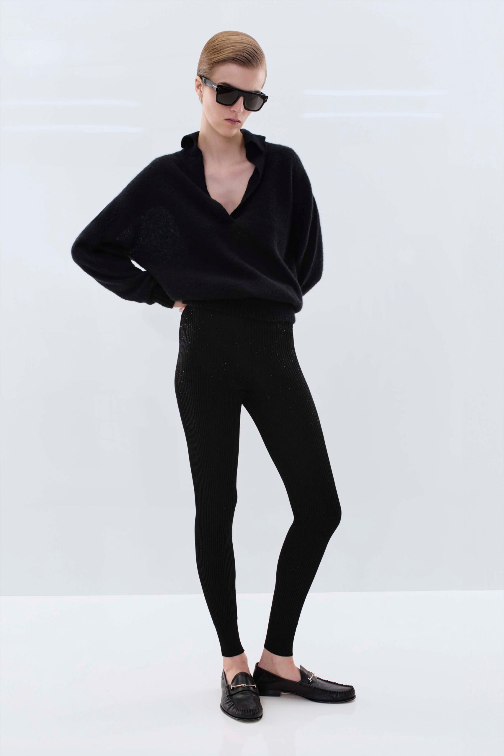black relaxed sweater with leggings