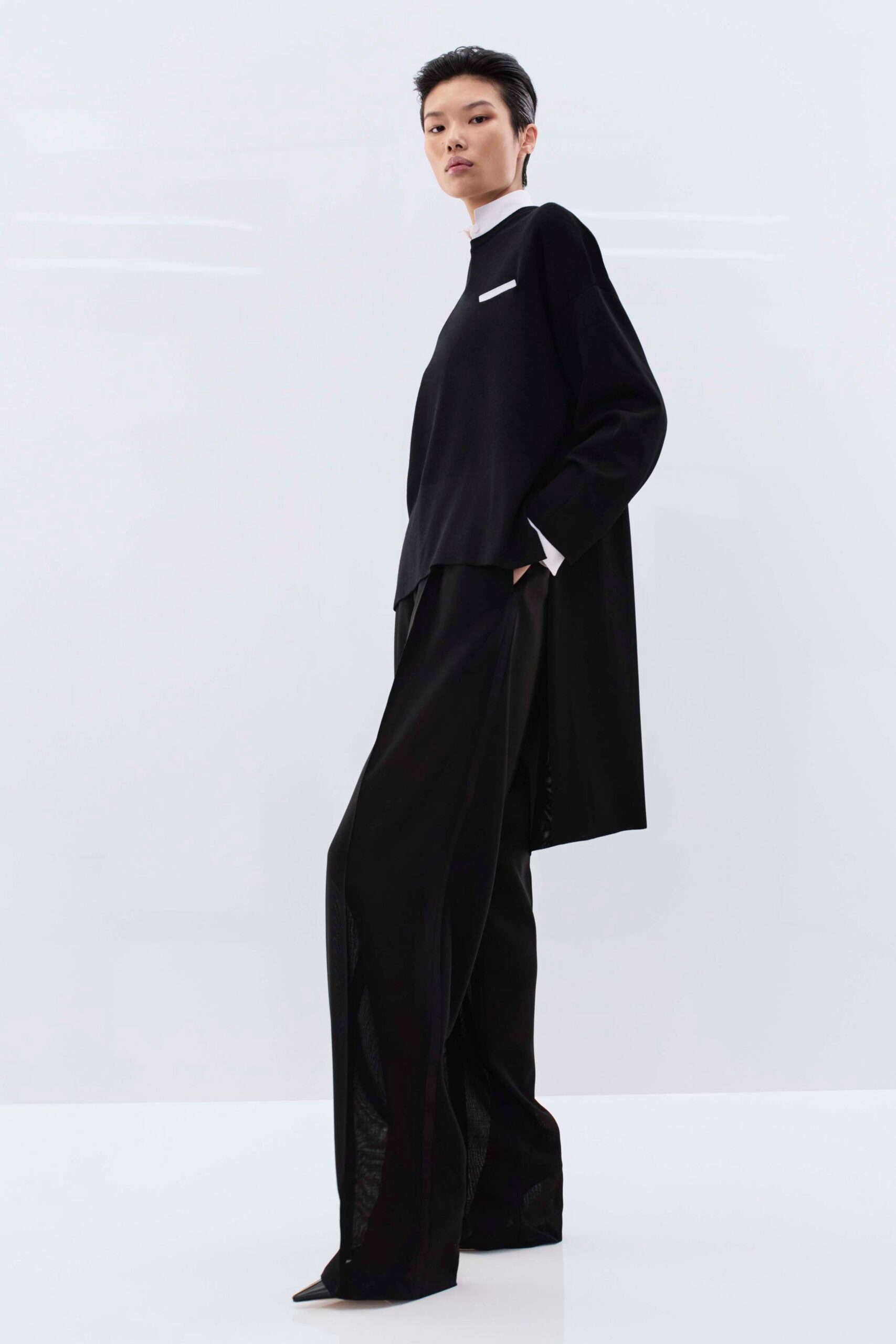black cotton long-sleeve high-neck relaxed top