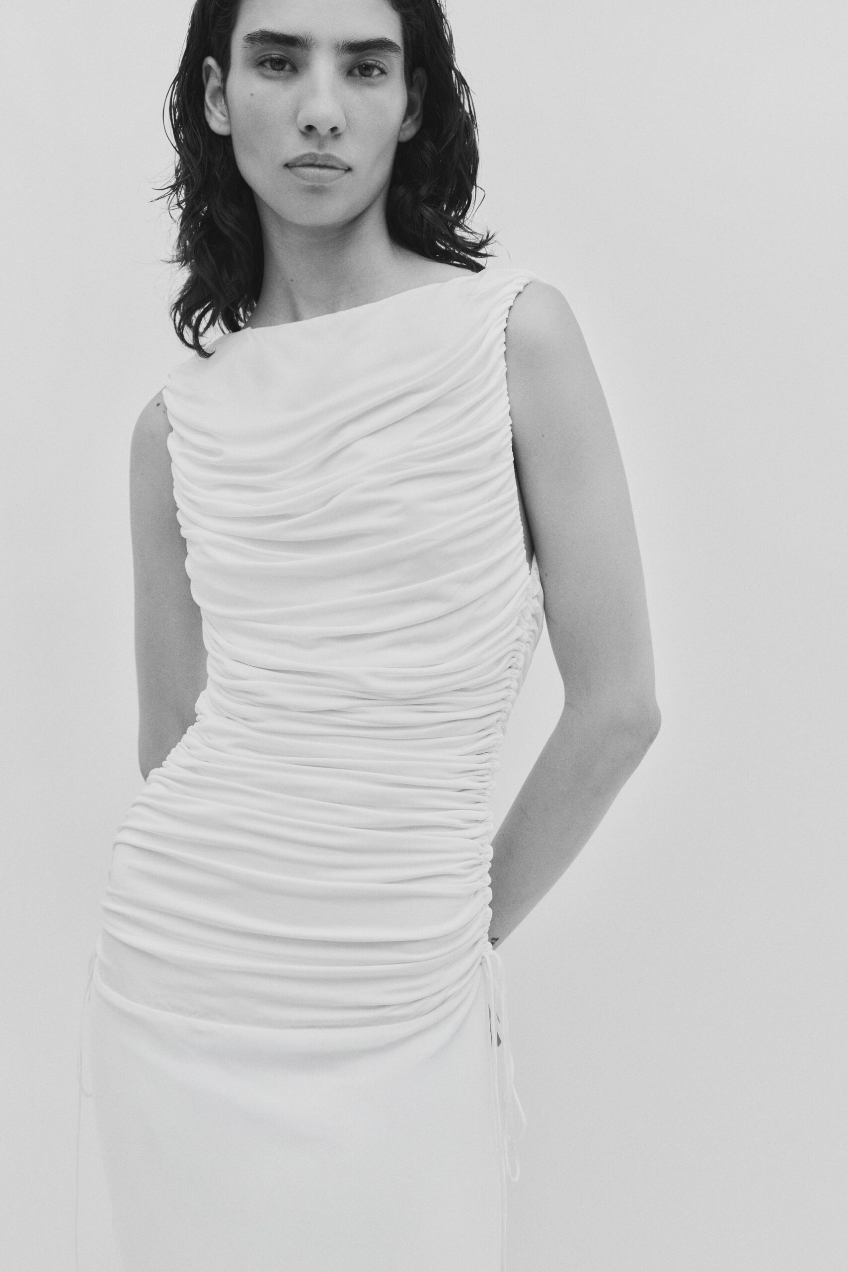 white silk sleeveless ruched dress
