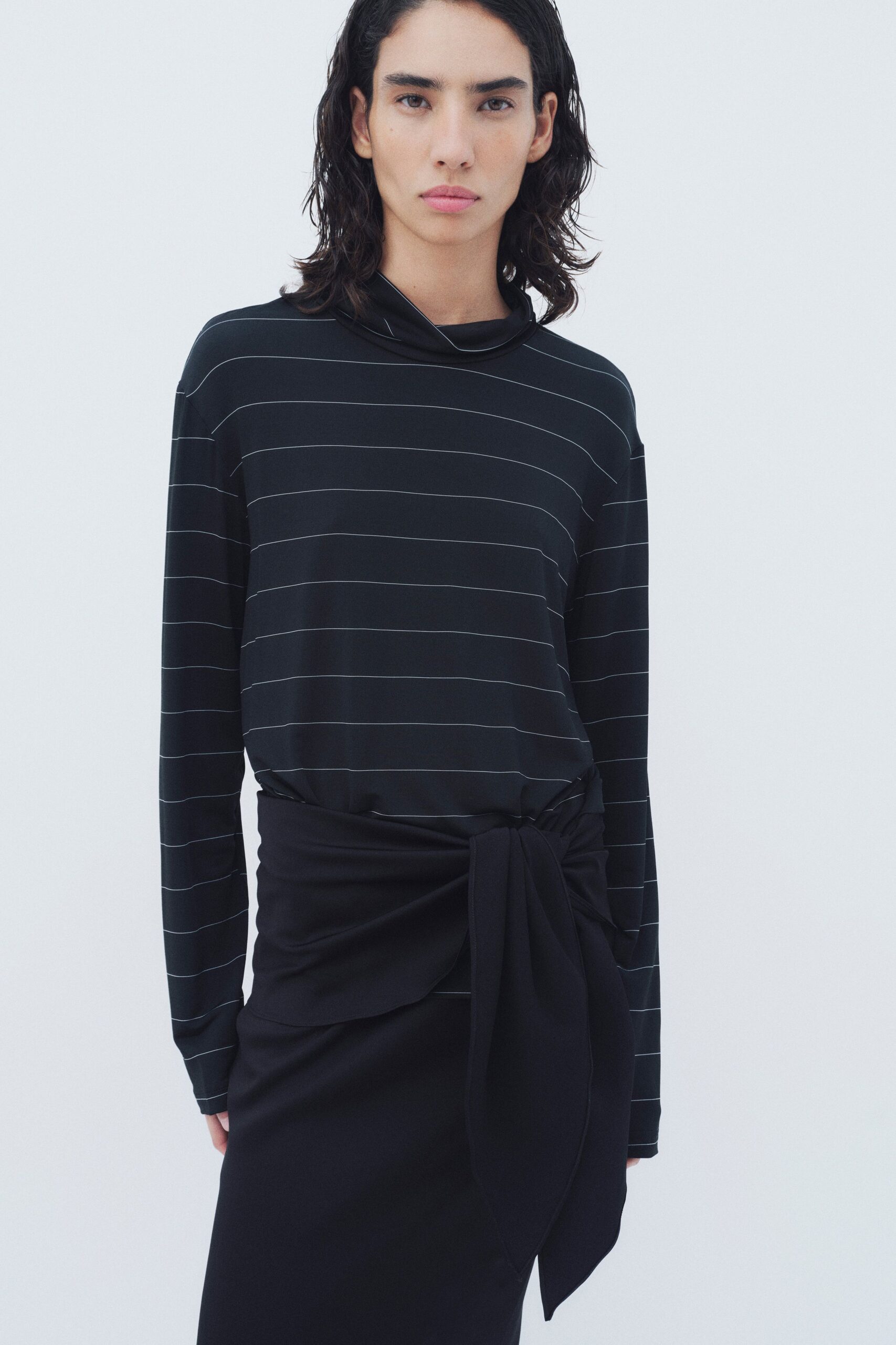 black and white striped top with belted skirt