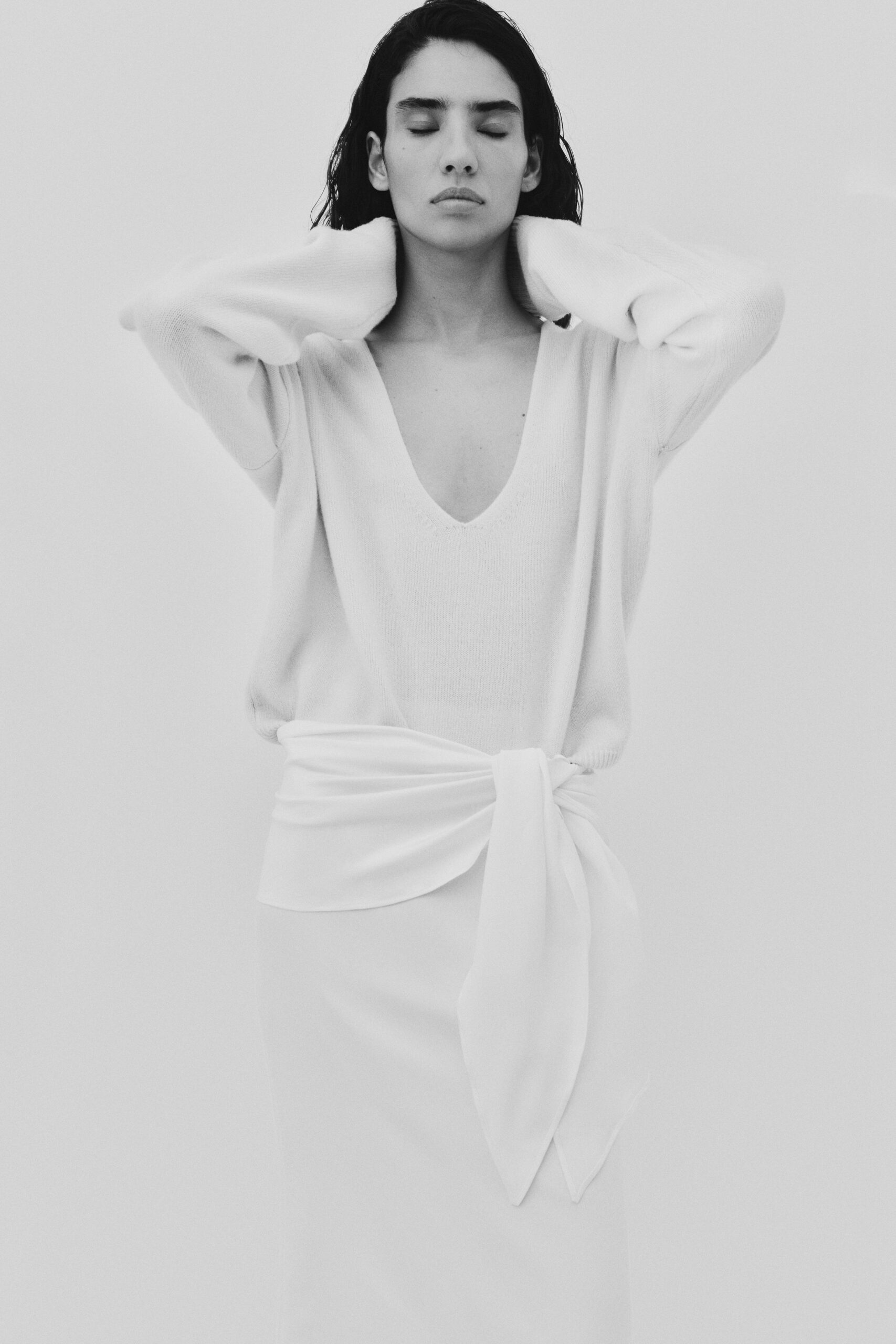 white relaxed top and fitted skirt