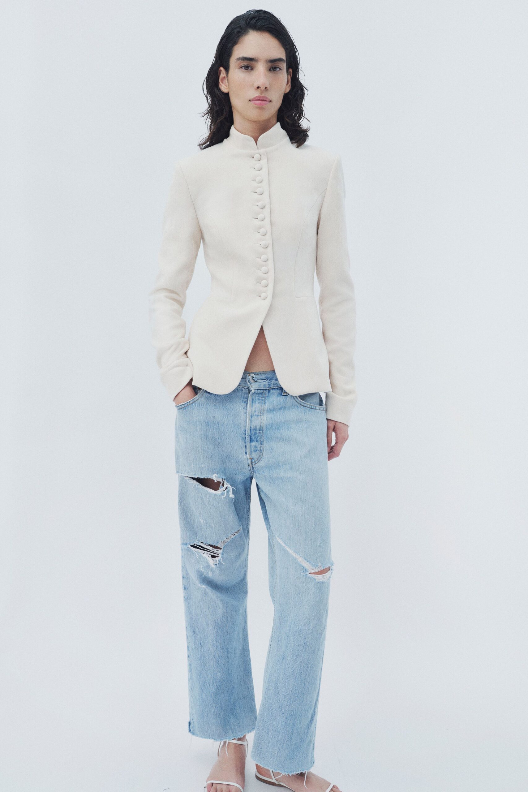 white cotton long-sleeve collared tailored buttoned blazer