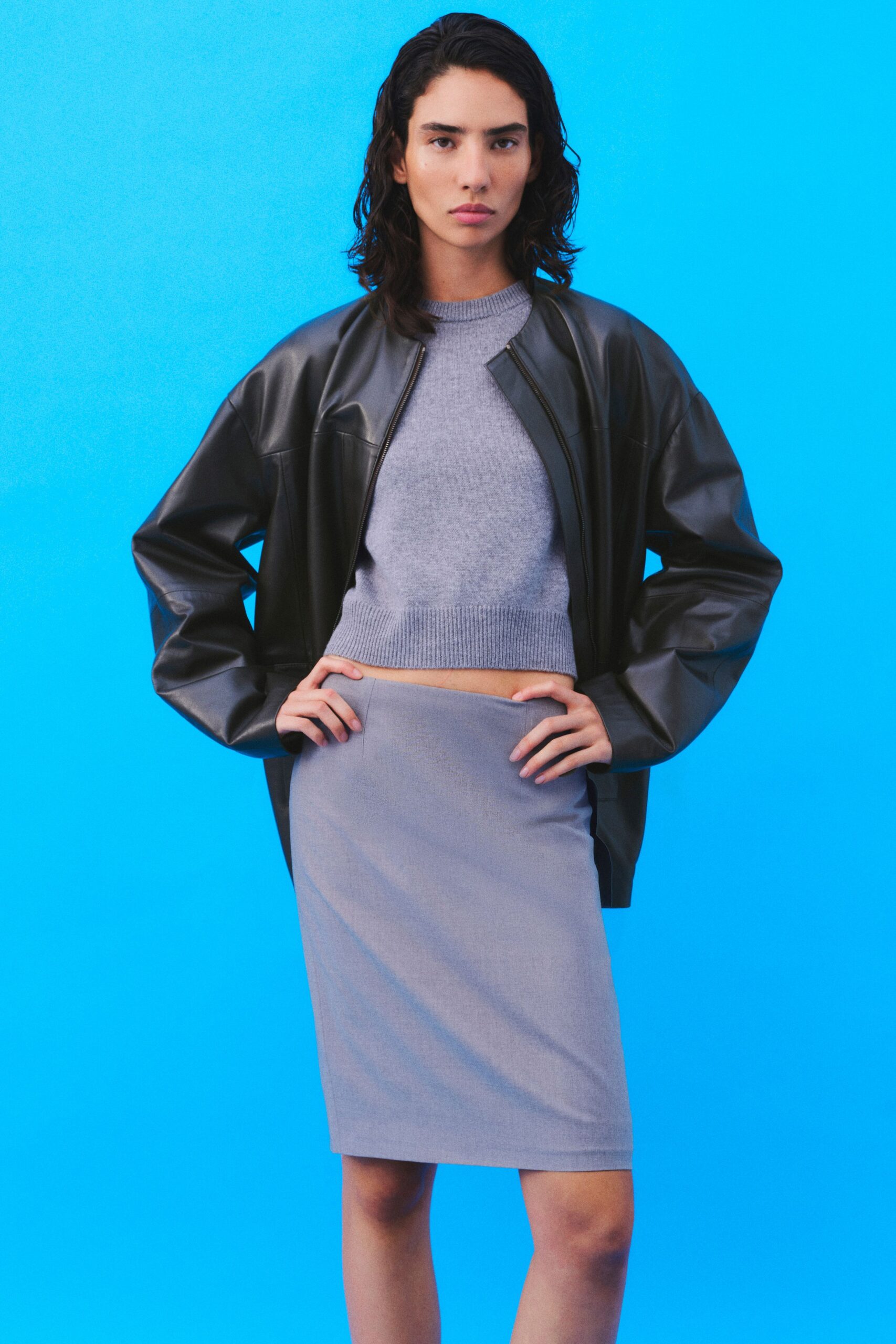 black leather oversized jacket gray top pencil skirt