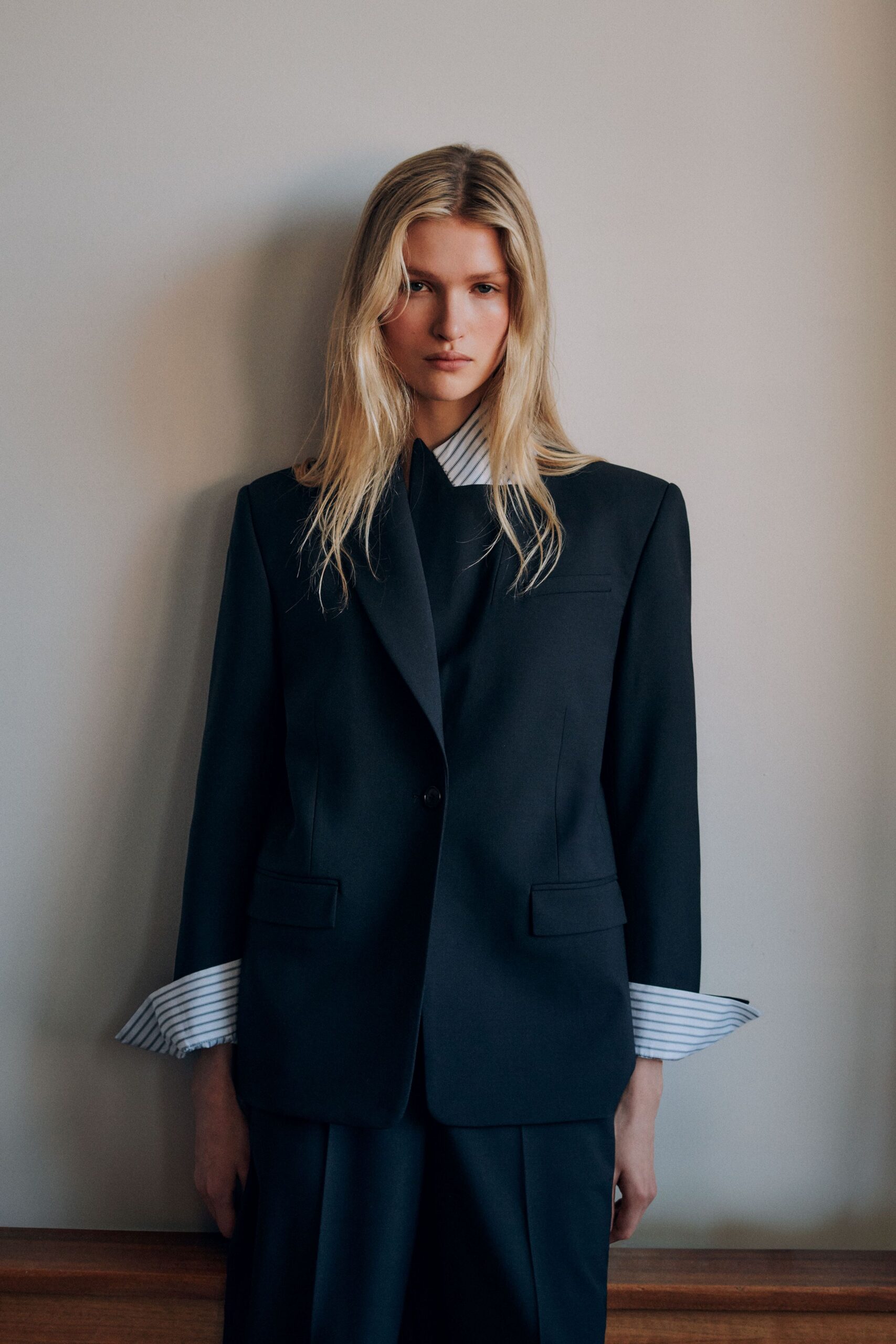 black wool long-sleeve collared structured buttoned blazer