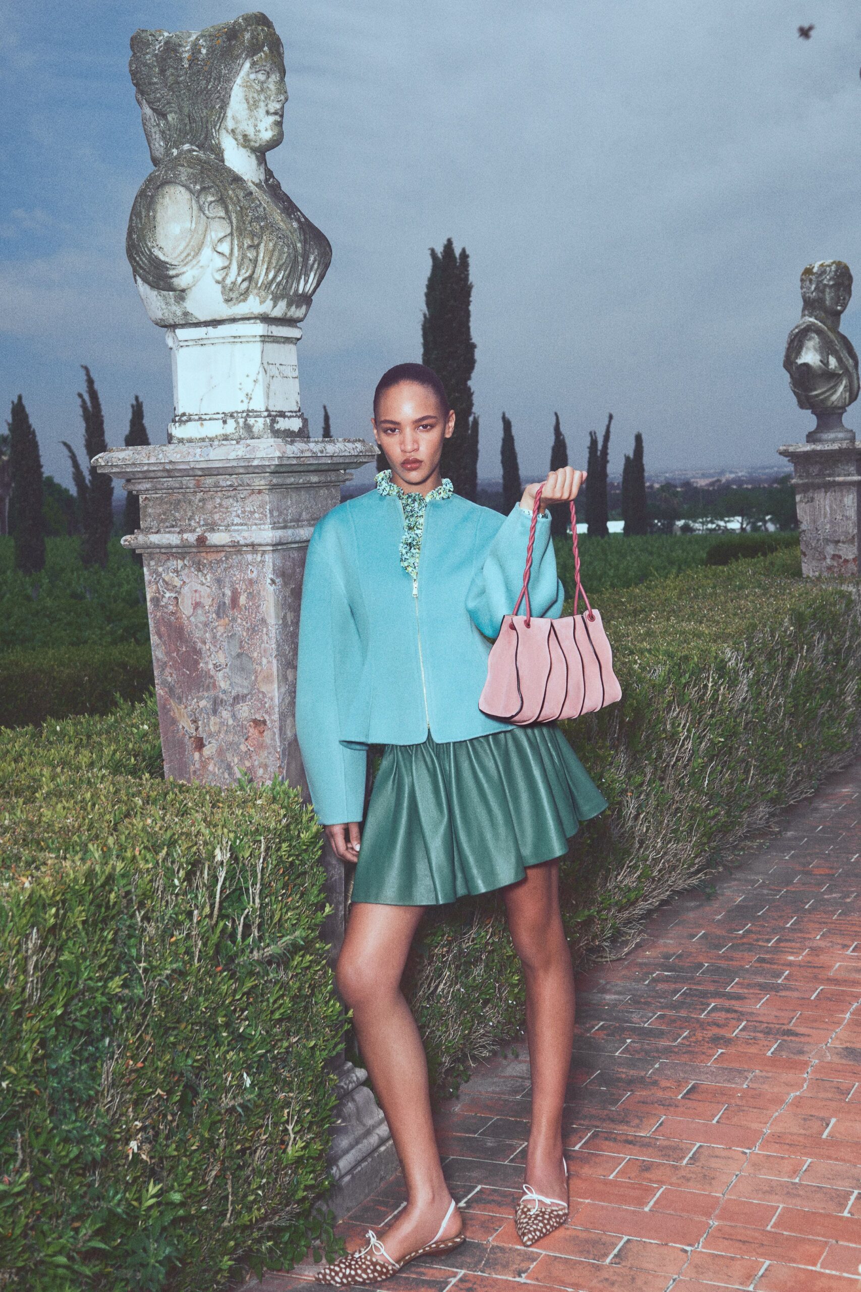green leather fitted pleated mini skirt