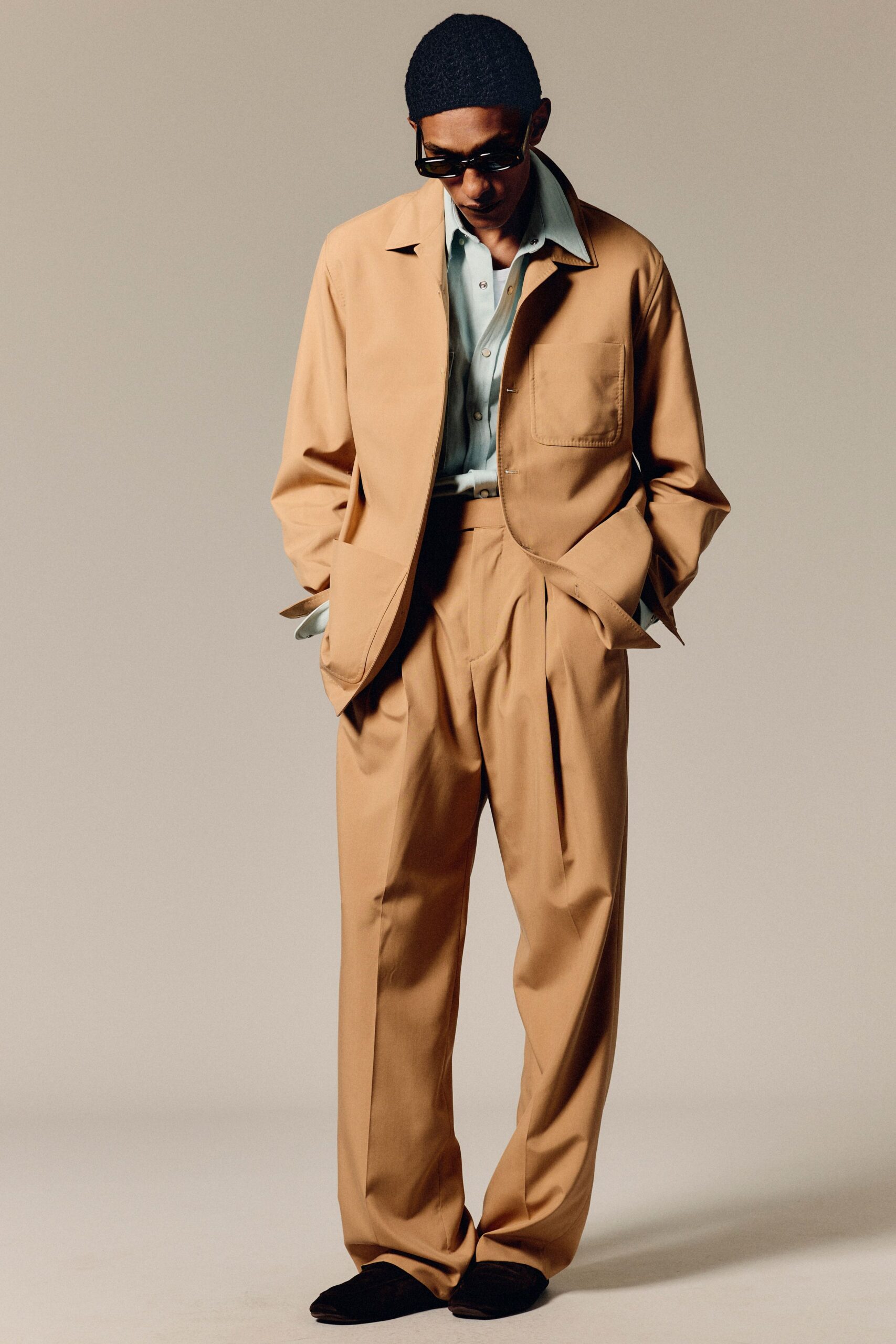 beige tailored blazer with blue shirt