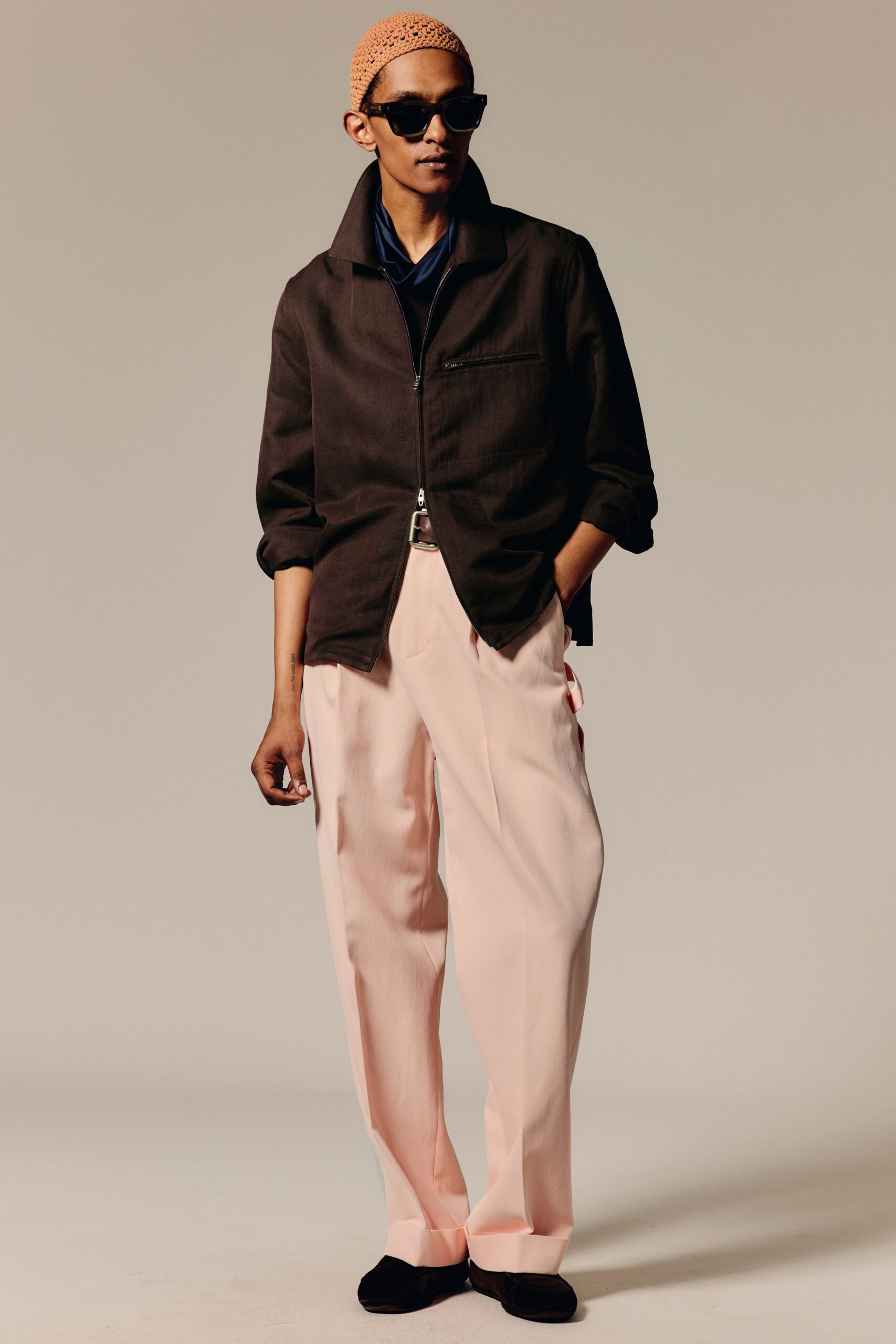 black relaxed jacket blue shirt pink pants