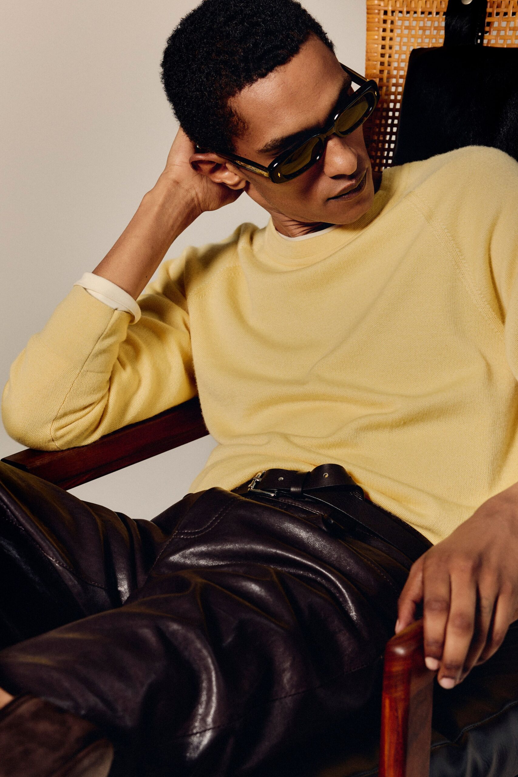 yellow wool sweater brown leather pants