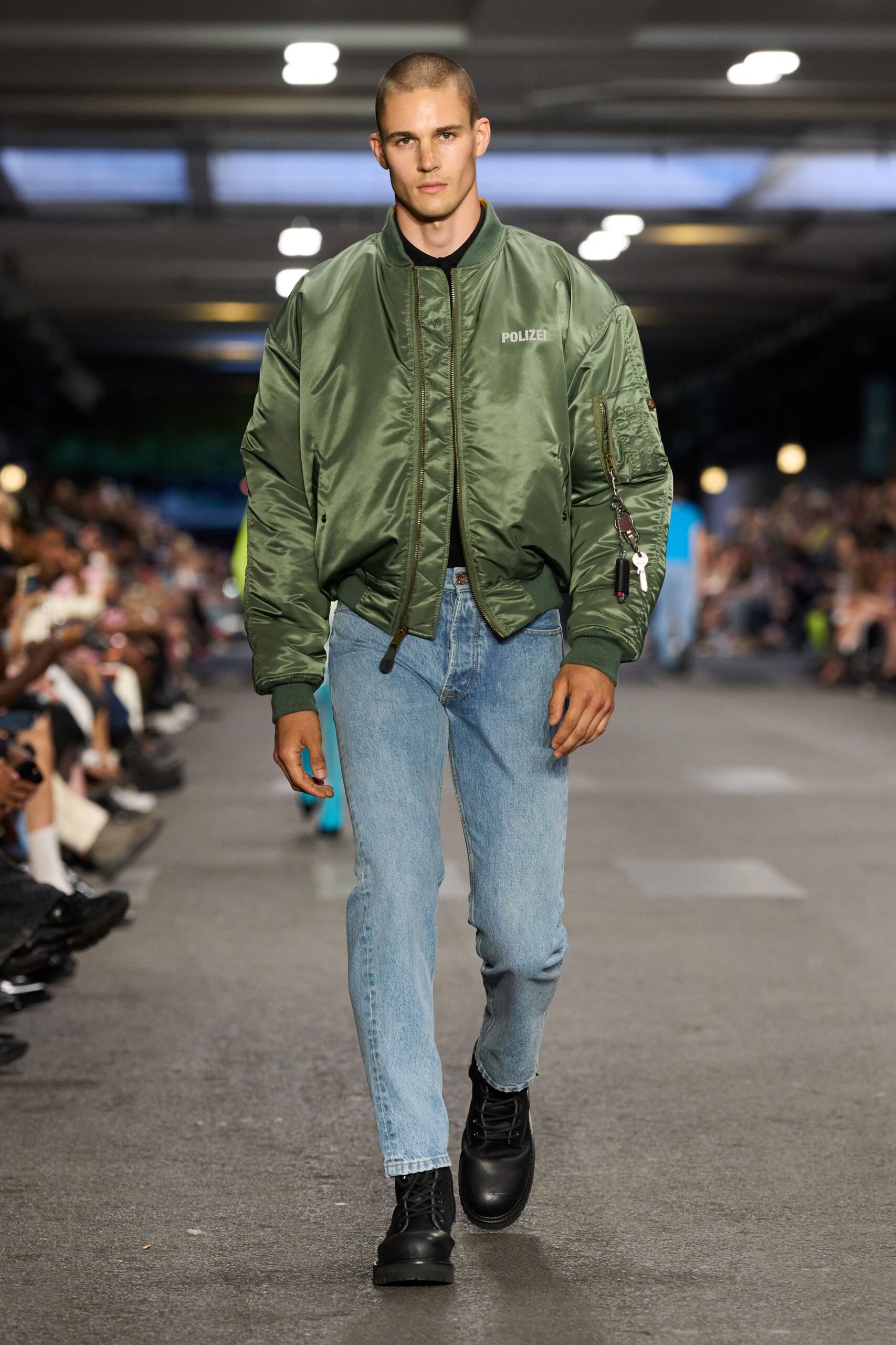 green bomber jacket with jeans