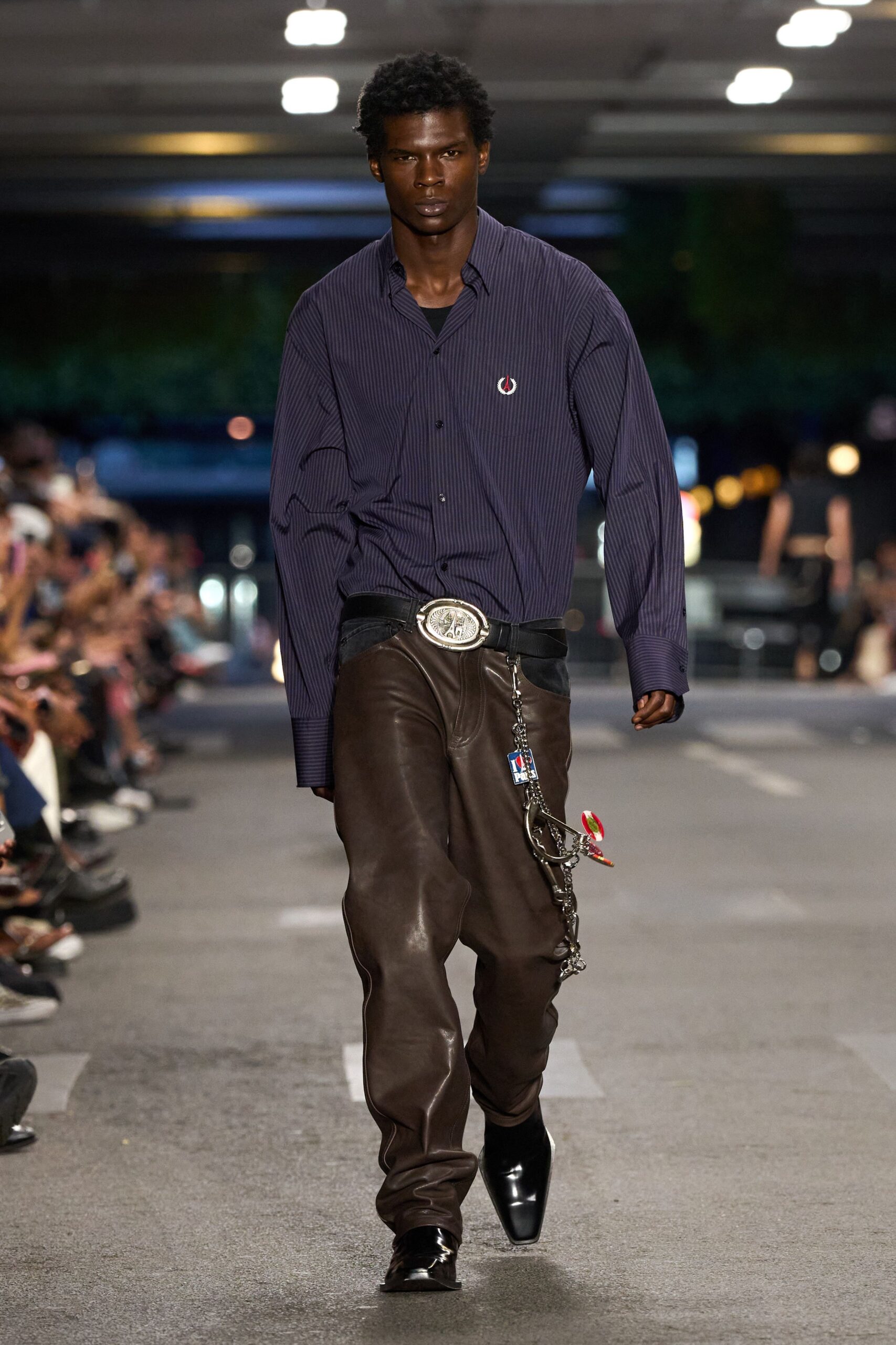blue striped shirt brown leather pants