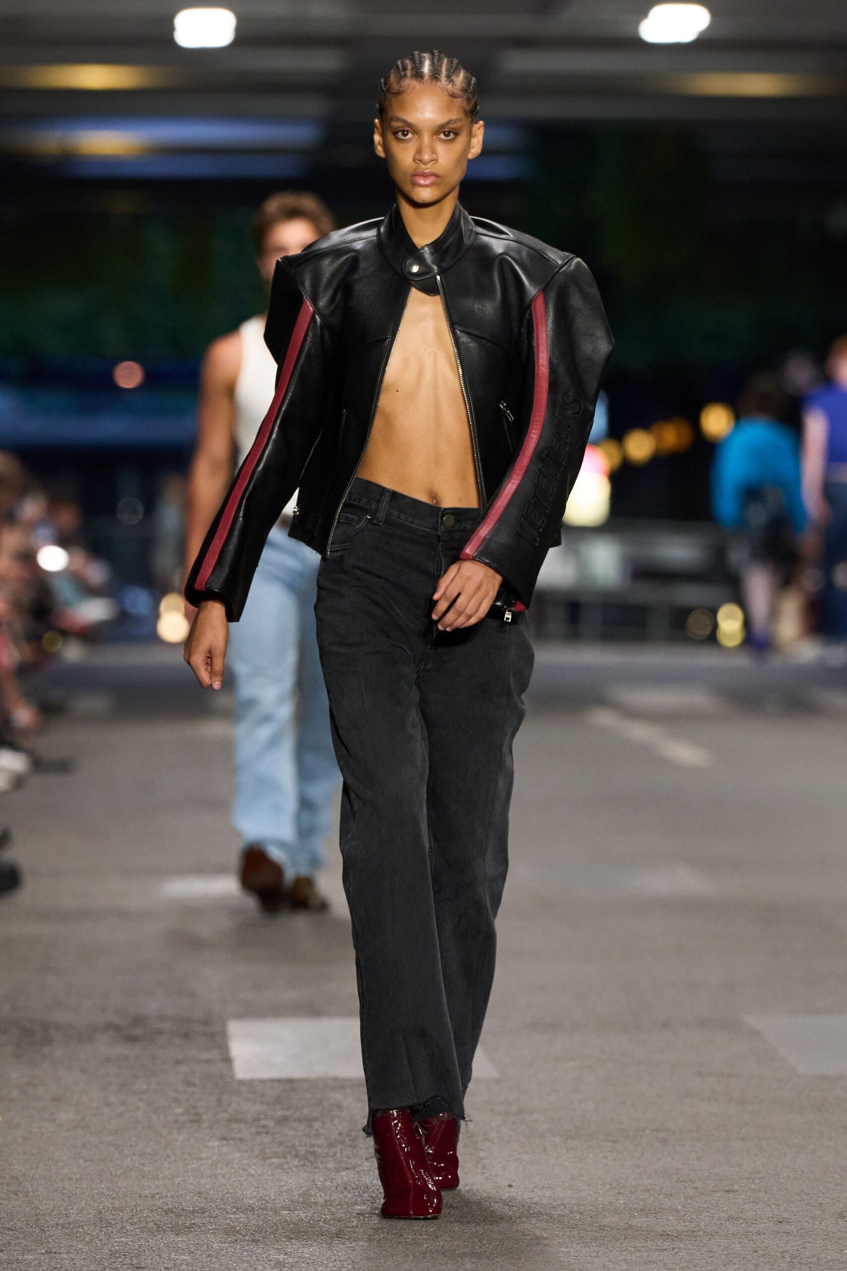 black leather fitted jacket with red details
