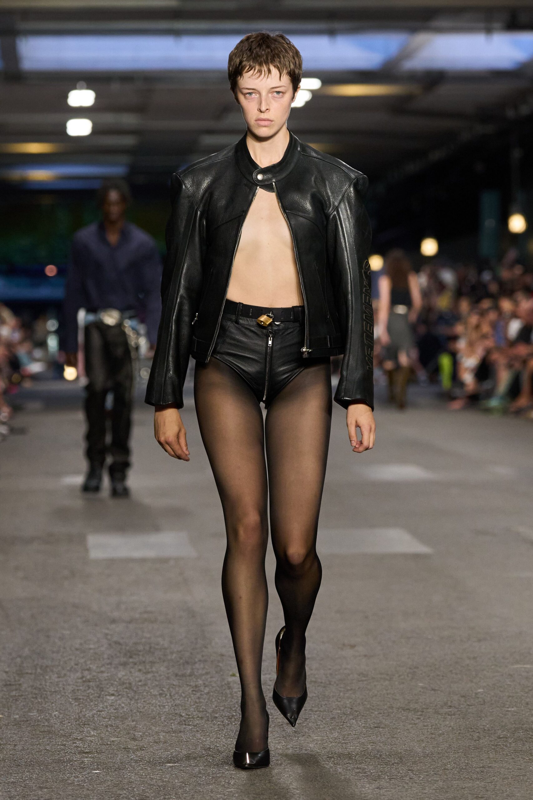 black leather fitted jacket and shorts