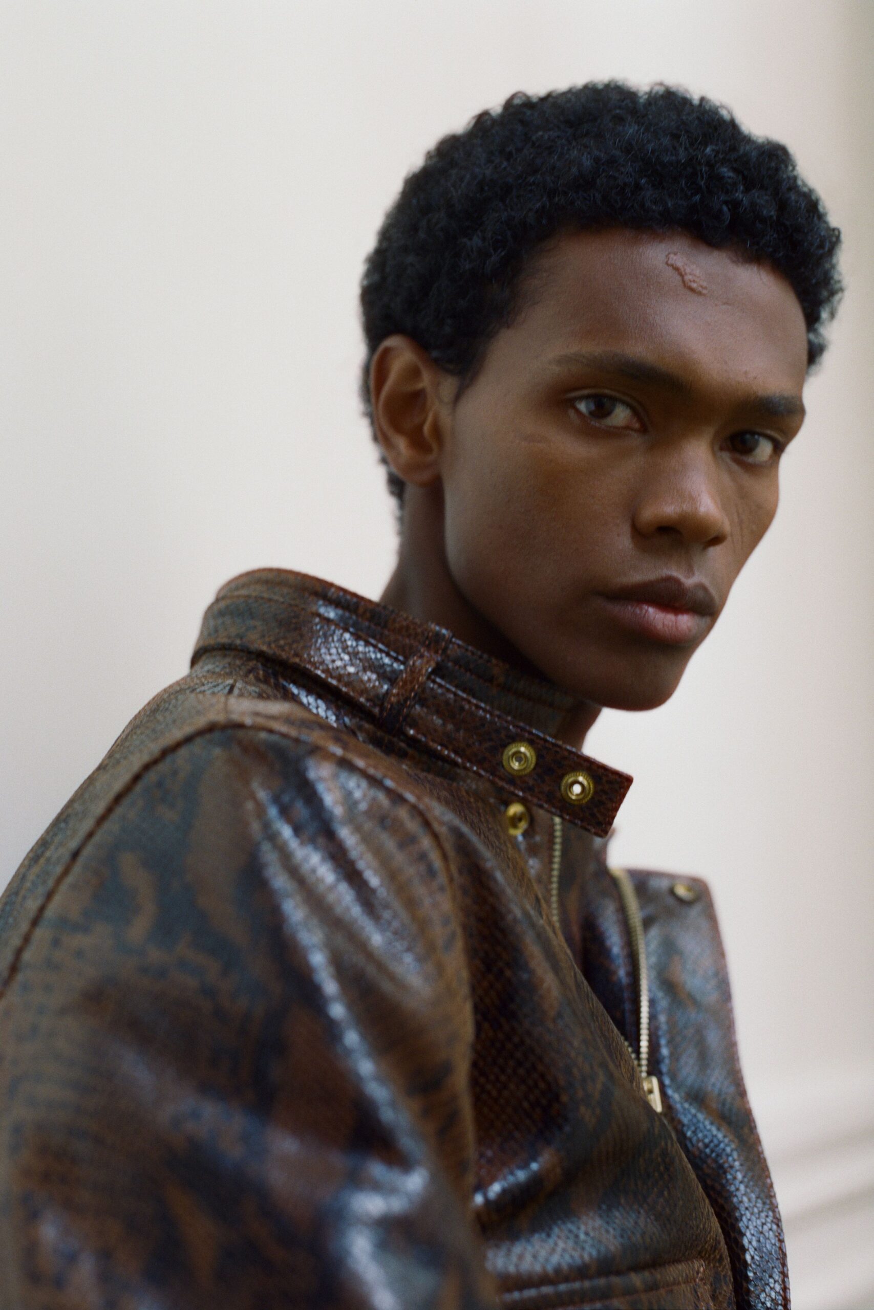 fitted brown leather jacket